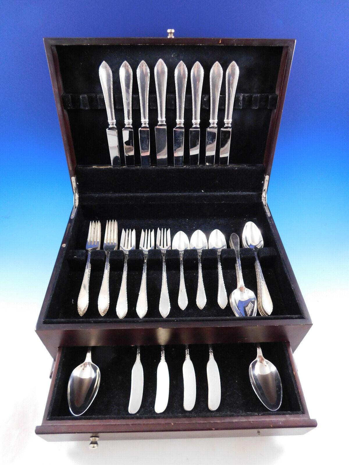 Gorgeous Feather Edge by Tiffany and Co. sterling silver Flatware set, 50 pieces. This set includes:

8 Regular Knives, 9 1/4