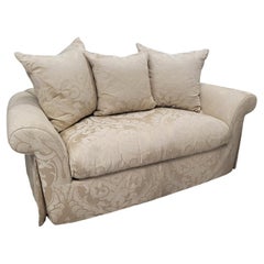 Feather-Filled Damask Loveseat with Rolled Arms and Pleated Skirt