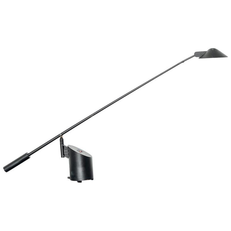 Halogen task lamp designed by Robert Sonneman for Kovacs, 1980s. Long tapered stem with big counterweight. Two brightness settings.