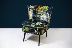 Feathered cocktail chair in rich appliquéd velvets by award-winning artist