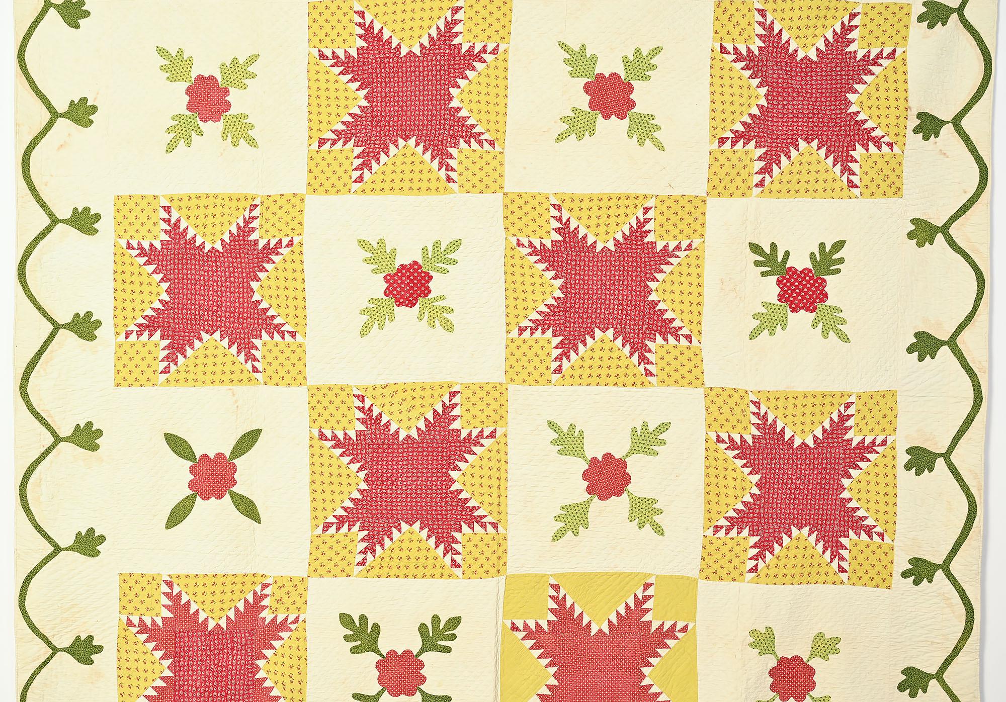 Feathered Stars are beautifully combined with Oak leaves in this quilt from the 1860s. While the Stars are all identical, the maker took liberties with the Oak leaves. Most are the same but she varied the Size and colors in several. In one applique,