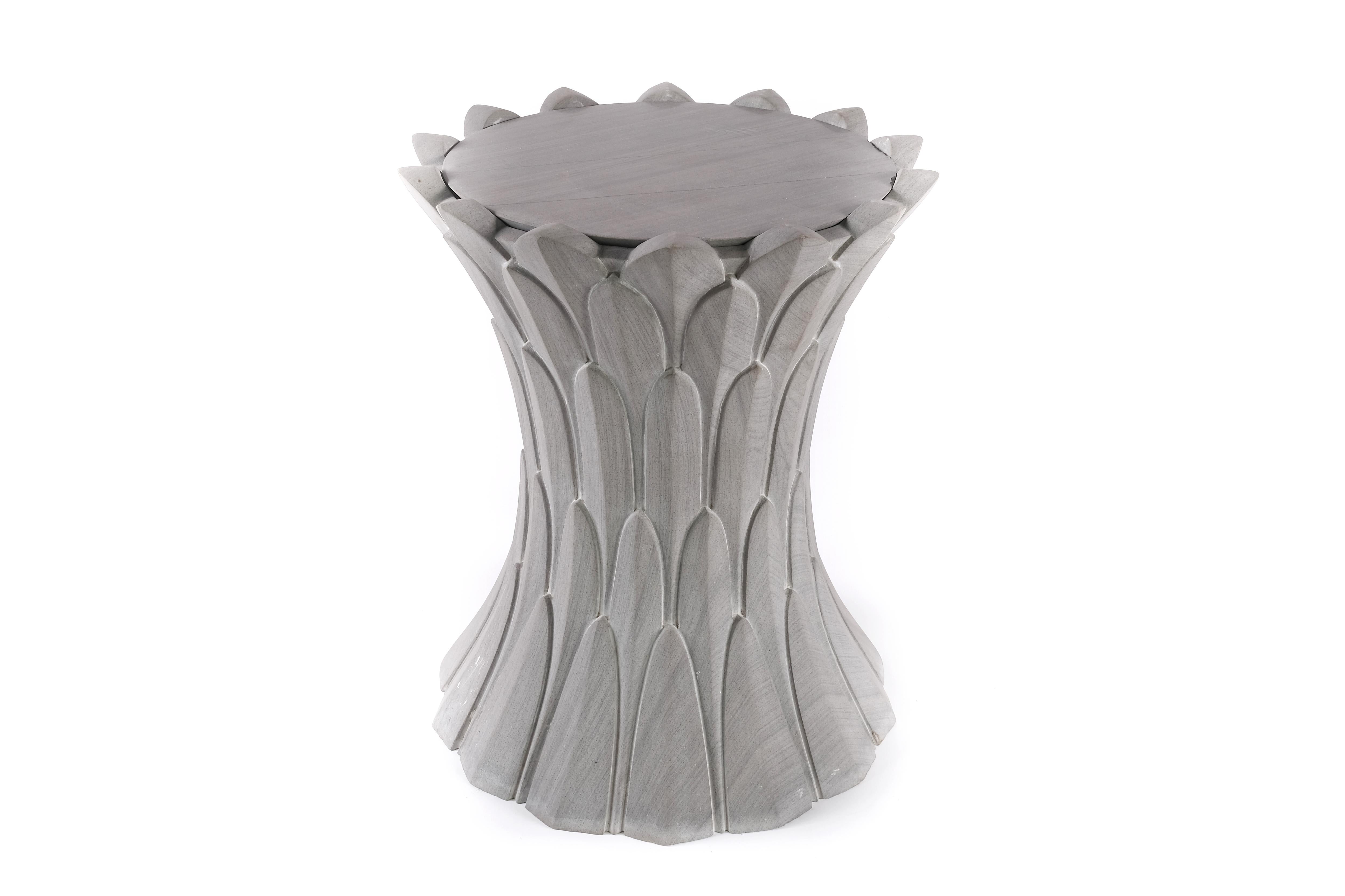 Feathers Marble Side Table or Small Round Marble Side Table is a true masterpiece of craftsmanship, hand-carved by skilled artisans in India who have honed their craft over generations. These artisans use traditional techniques to create each