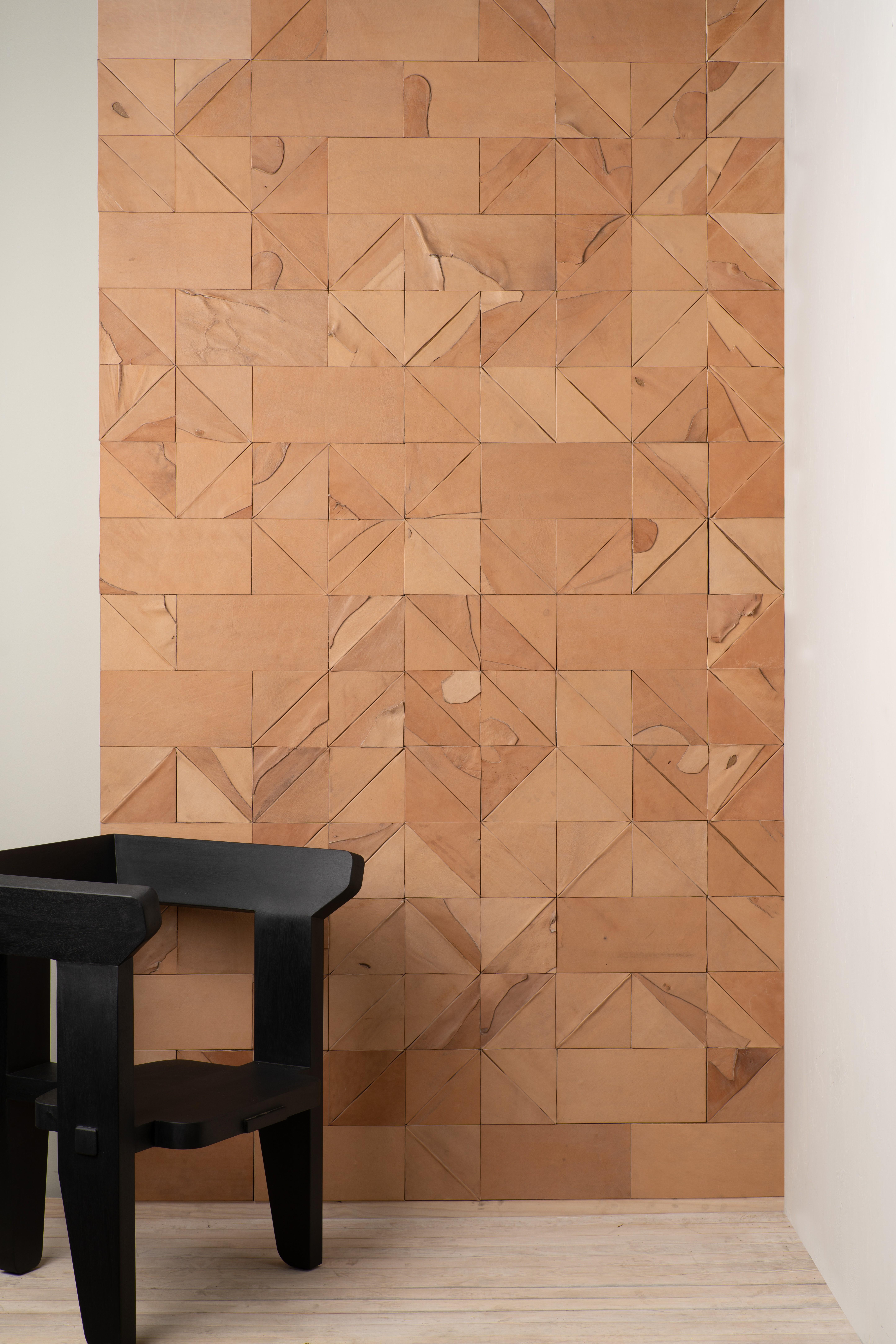 These NATURAL LEATHER collage tiles are made in modular sizes and SOLD BY THE SQUARE FOOT, NOT PER TILE. The tiles can be hung on any wall surface and in any configuration. Each panel is composed randomly and therefore, no two panels are alike. They