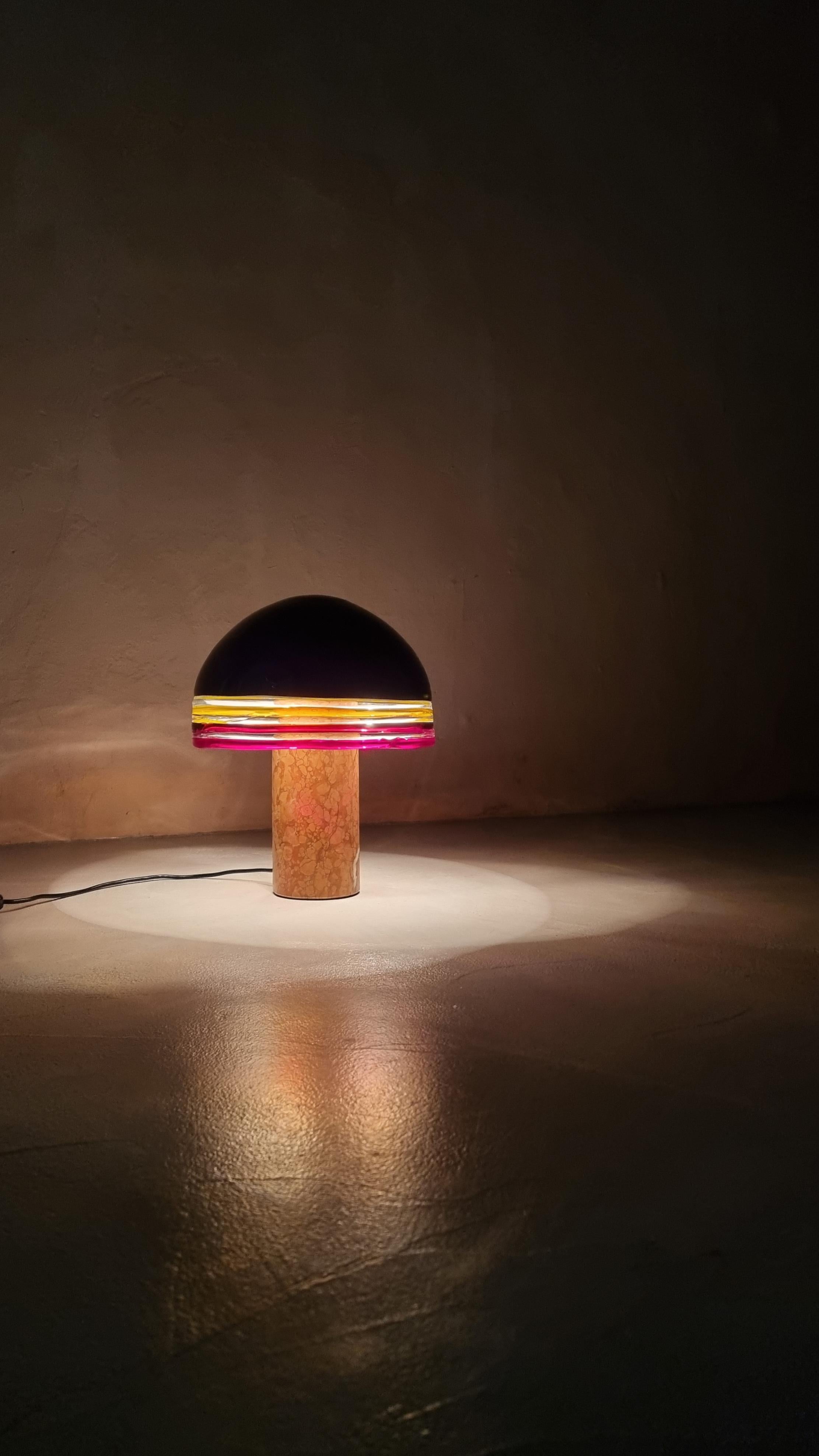 Rare table lamp mod. Febo designed by Roberto Pamio and Renato Toso for Leucos in 1970.
Verona red marble base , stained glass diffuser.
This rare variant of mod. Febo is part of a limited series of pieces produced by Leucos in the 1970s.The marble