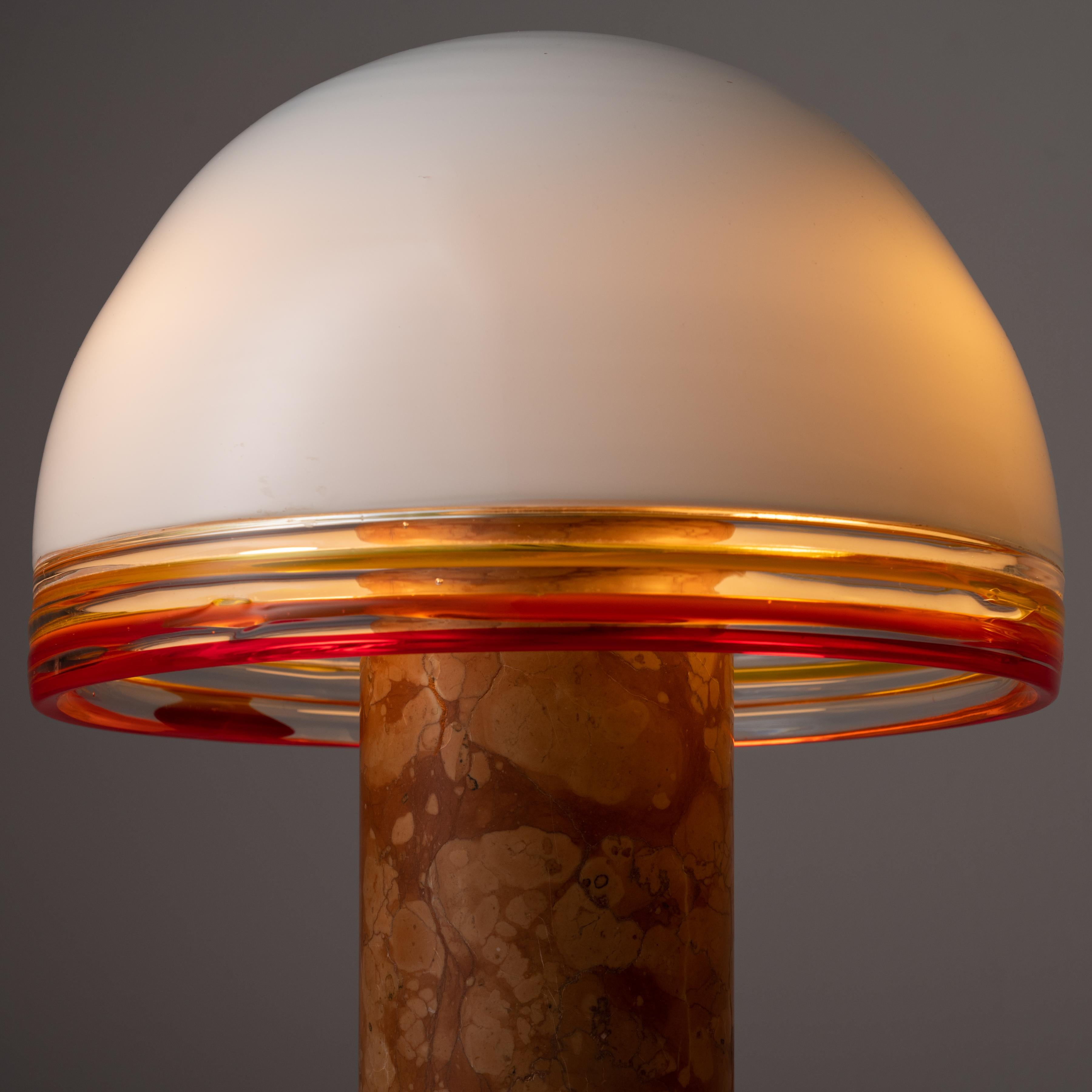 ‘Febo’ Table Lamps by Roberto Pamio and Toso for Leucos. Designed and manufactured in Italy, circa 1970. Playful and timeless table lamps with smooth marbled base and custom milk glass shades featuring red and yellow ridged detailing at the lip of