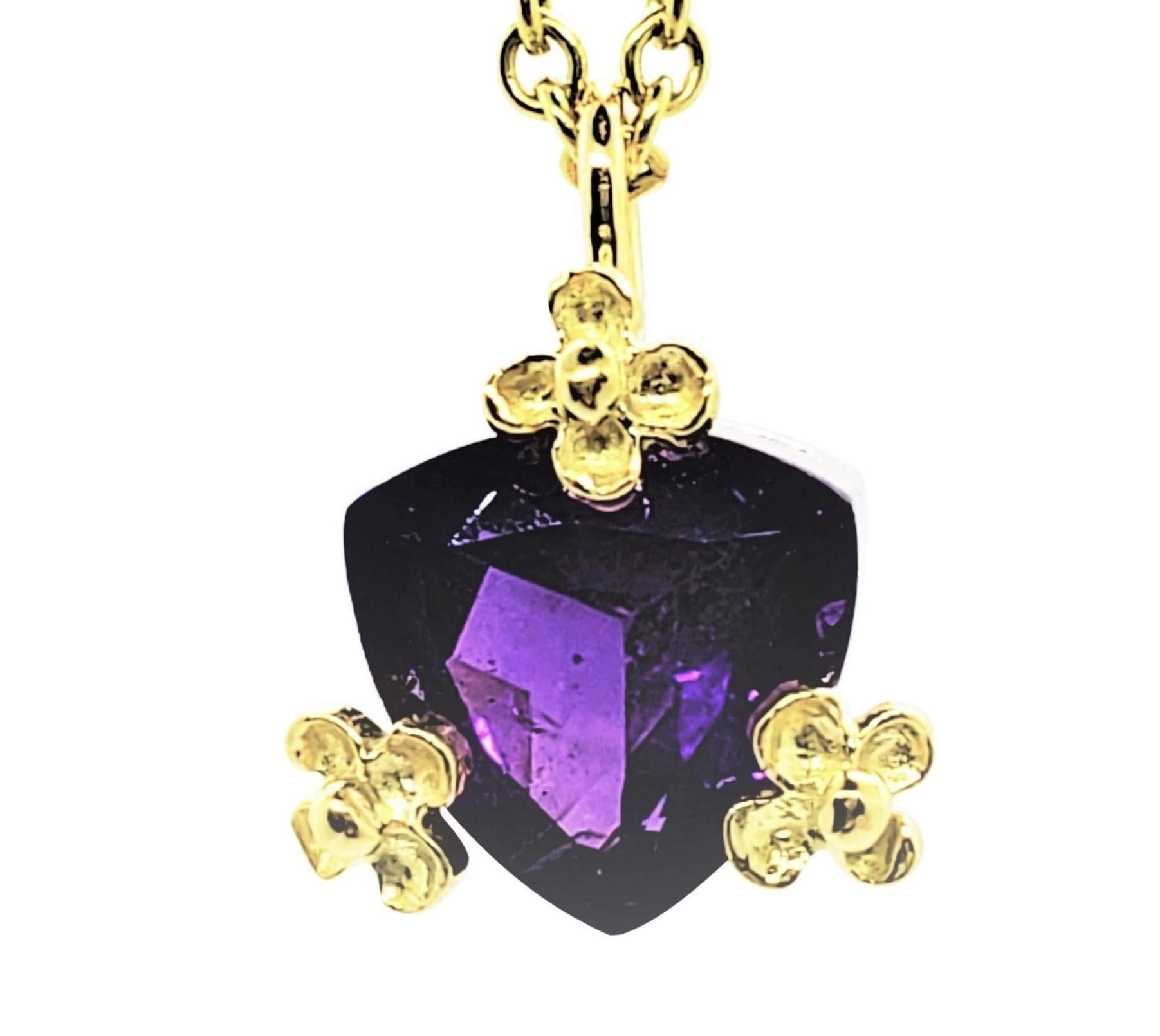 Made for February Birthstone Amethyst, a beautiful Trillion faceted gemstone set in a custom 14K Yellow and 14K Pink gold setting with 18K Y flower prongs.
Simplicity with a royal look in purple Amethyst and in a demure size, this design packs a lot