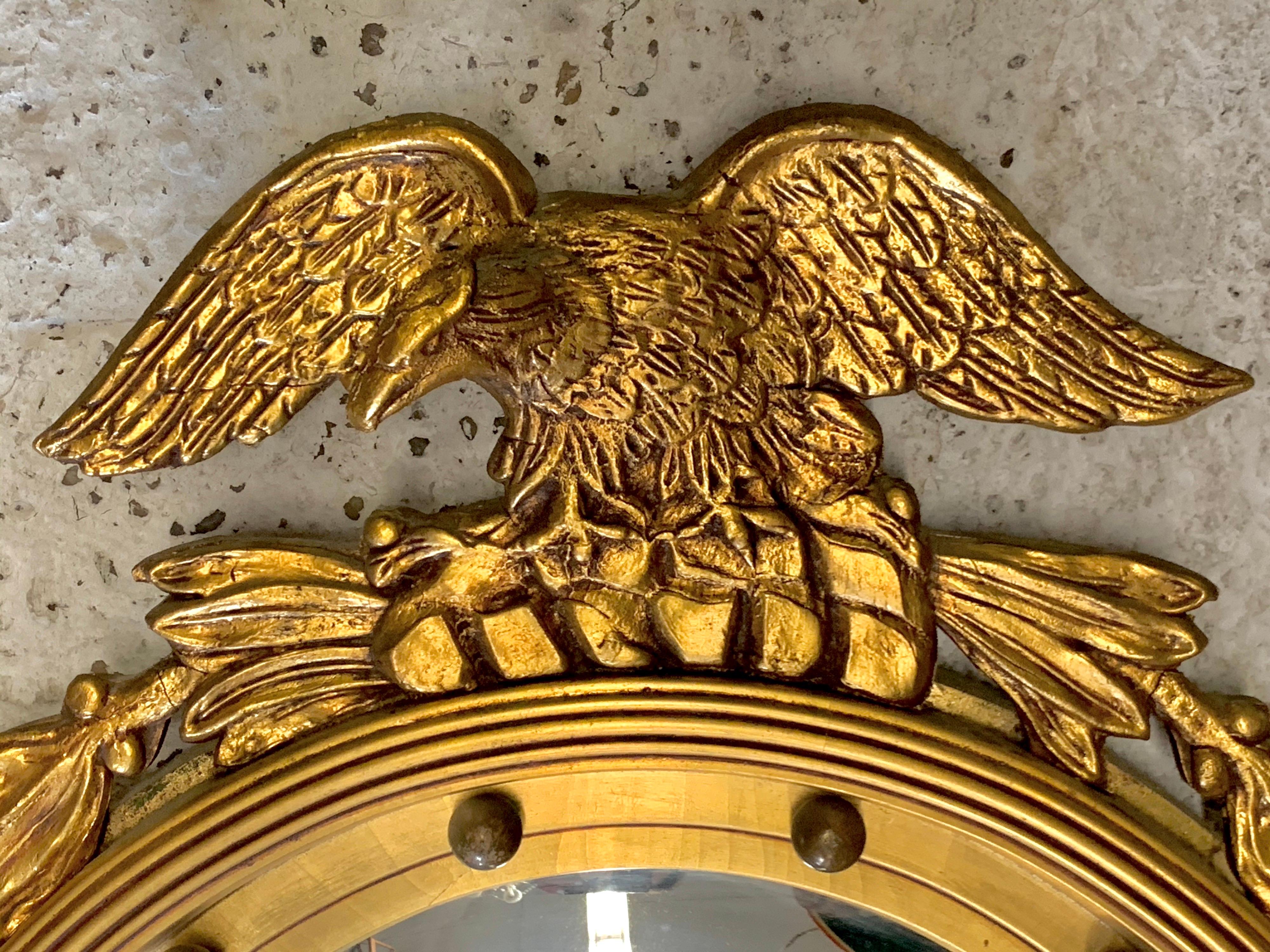 Coveted federal antique carved giltwood mirror with signature eagle crest at top. Some minor
losses in the giltwood which are easy to touch up.