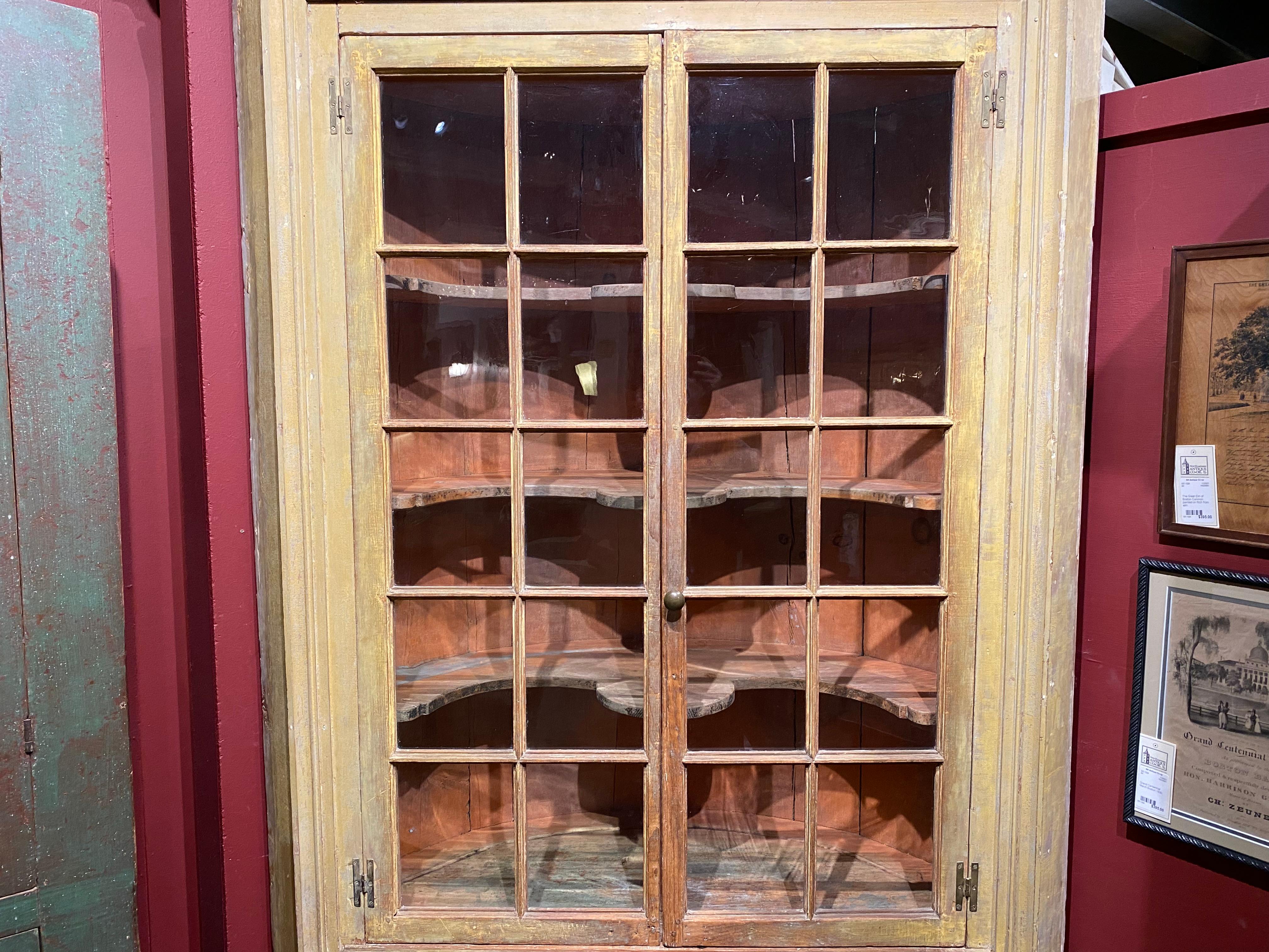American Federal Corner Cupboard in Early Yellow Paint with Glazed Doors & Barrel Back For Sale