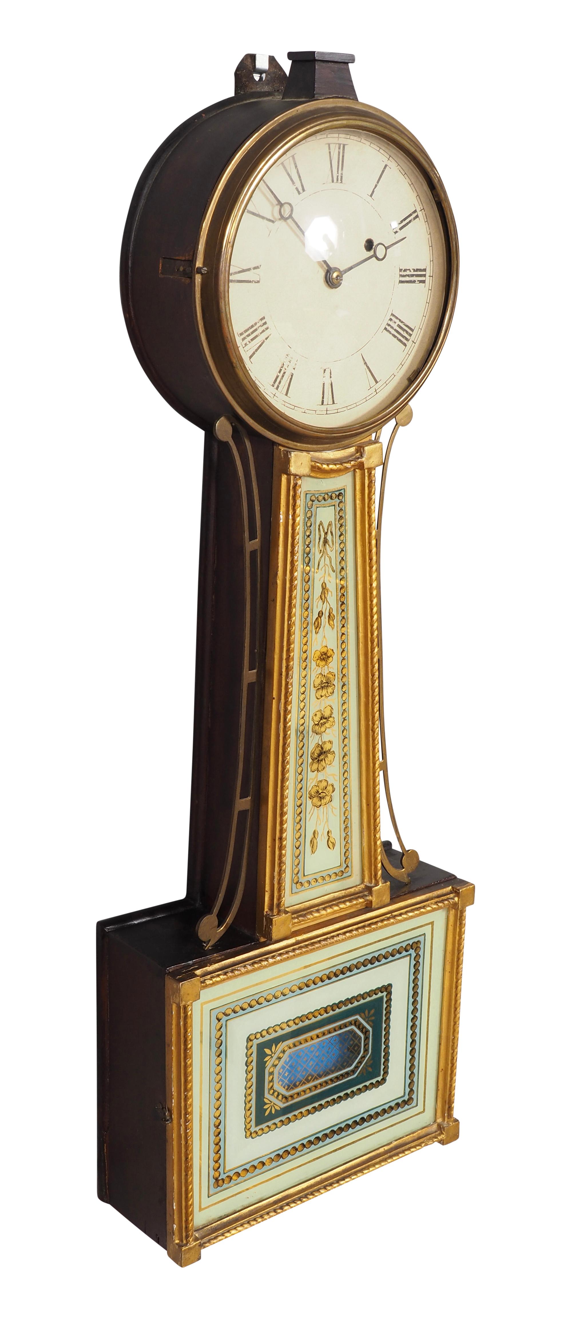 Typical form with white enamel dial and reverse painted waist and pendulum door. With key and pendulum.