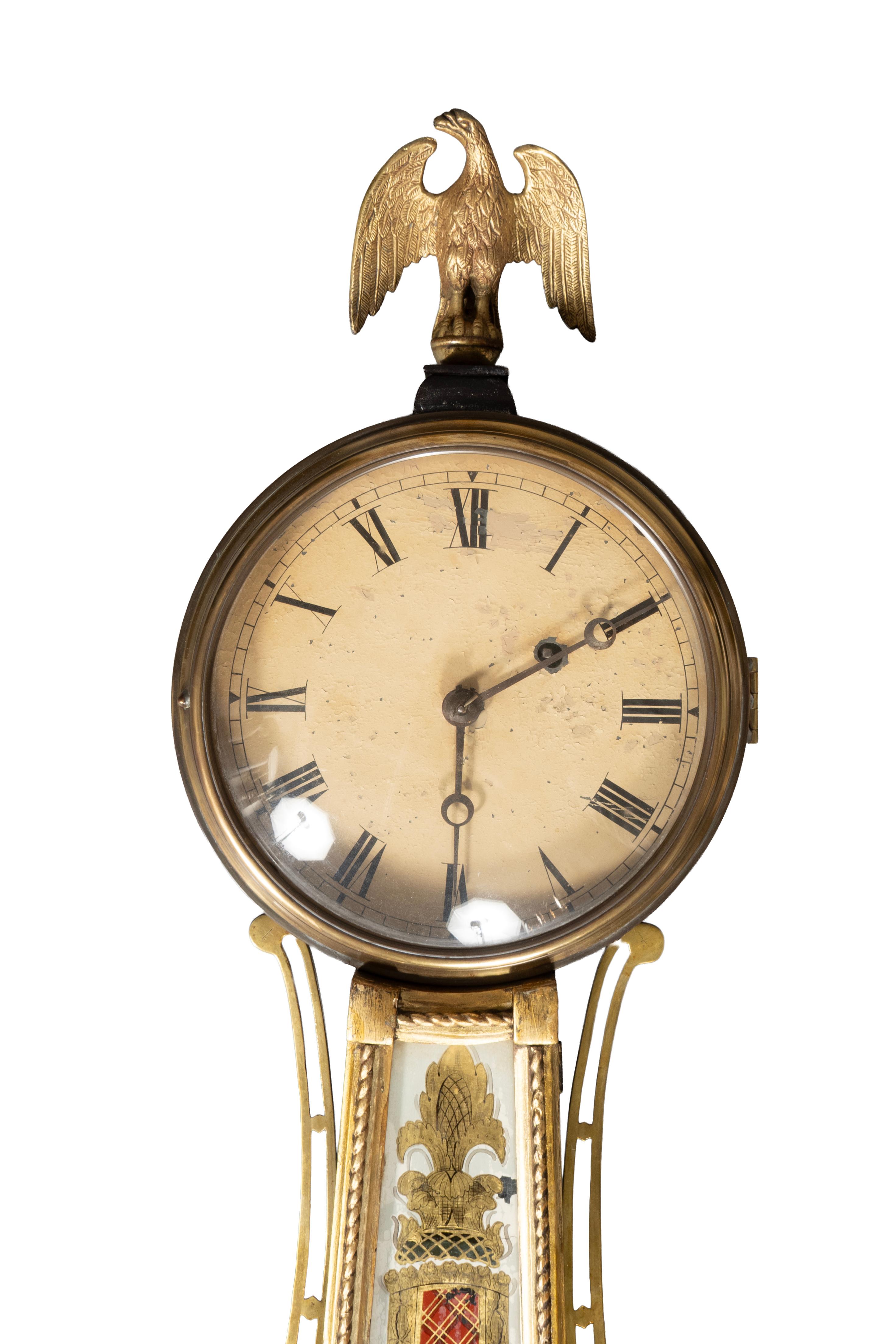 Typical form signed Willard on the reverse glass. Boston State house on lower panel. Brass eagle finial. Not currently working but can be.