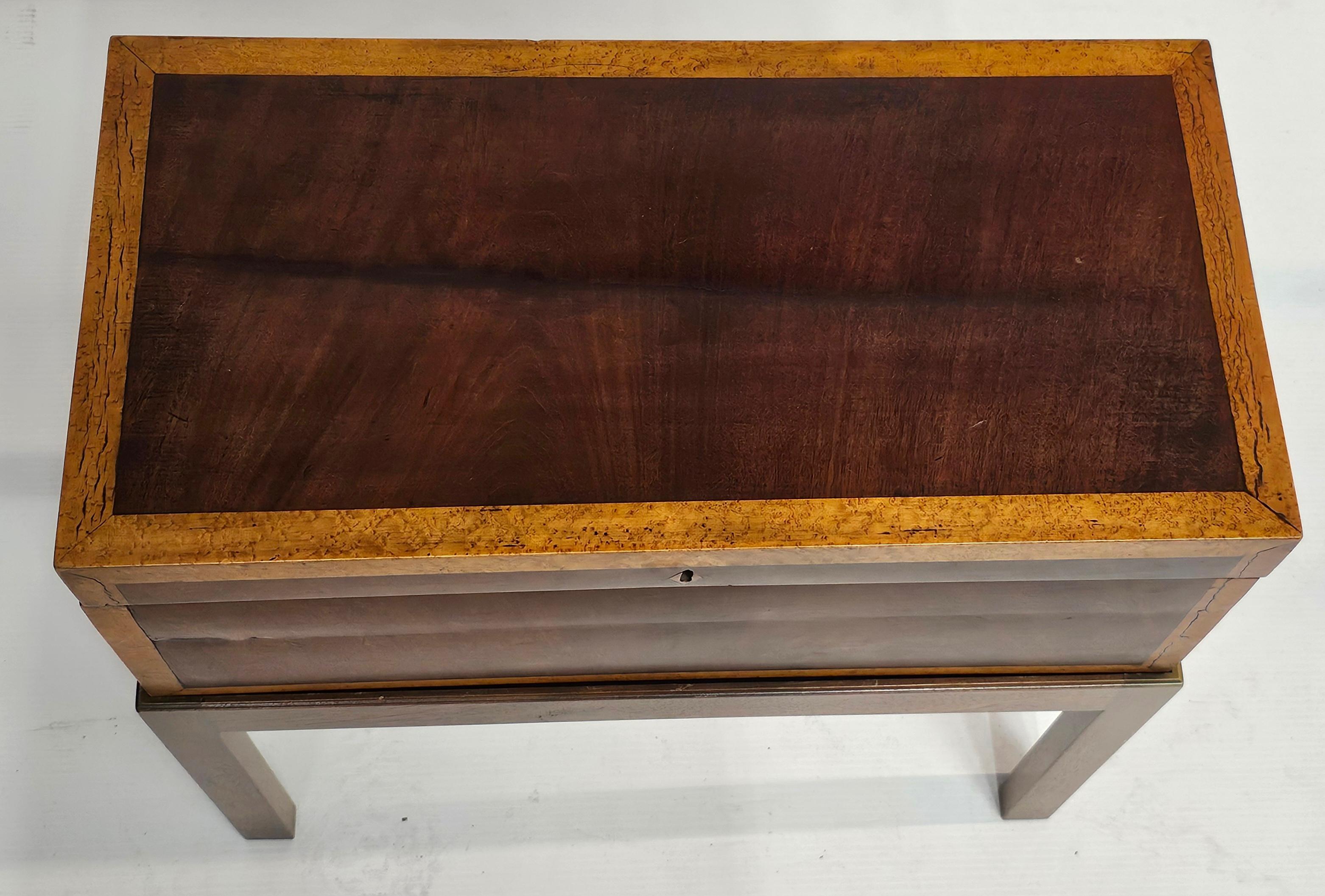 A Federal Era Mahogany and Birdseyes Maple Lap Desk on Stand, Circa 1810s
Measures 22.5