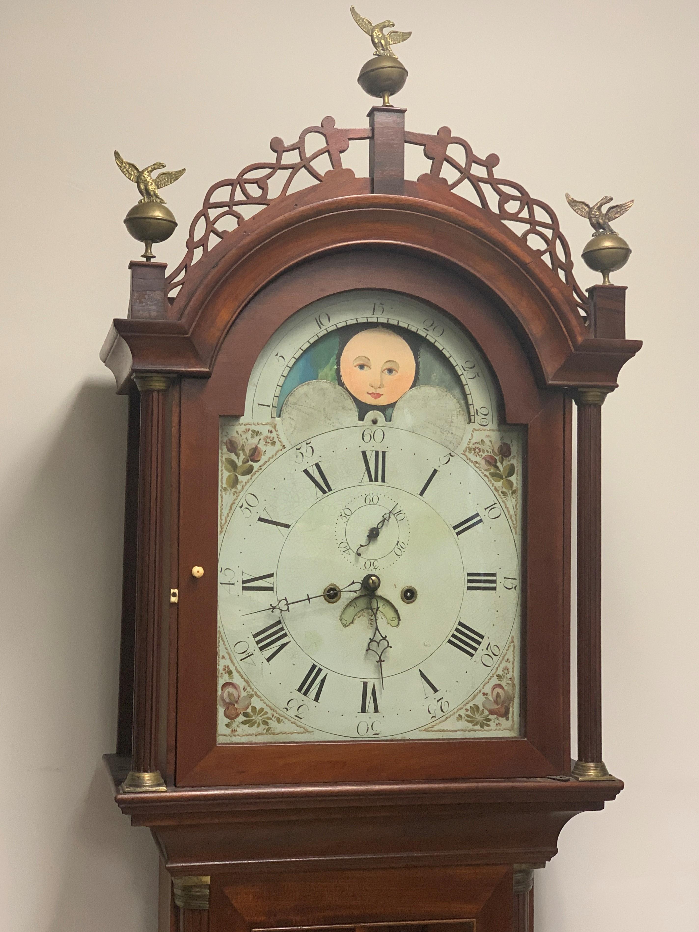 Roxbury type federal type tall case clock from North Shore, Massachusetts, ca 1805-1810.
Mahogany with rosewood crossbanding finial blocks veneered in rosewood.
Vetted, clean clock in all original condition including weights, clock face, finish.