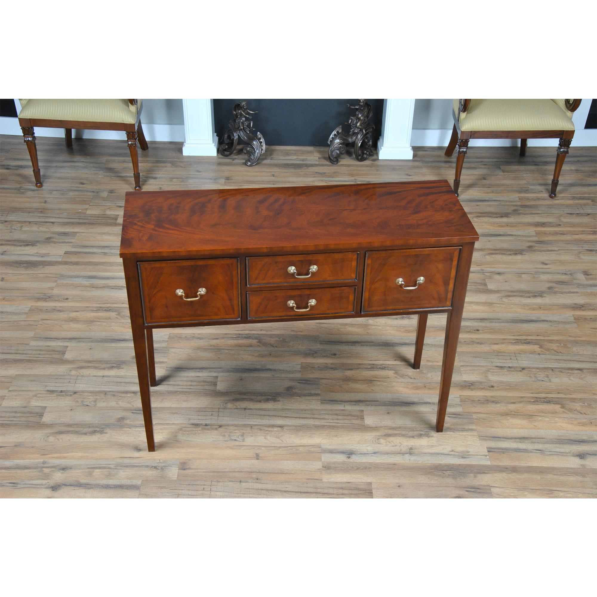An ideal sideboard for use in smaller spaces in the dining room the Federal Mahogany Sideboard is also designed to work with almost any decor. Ideal in a dining room the piece is also suited for use in a living room or hallway. Simple lines and