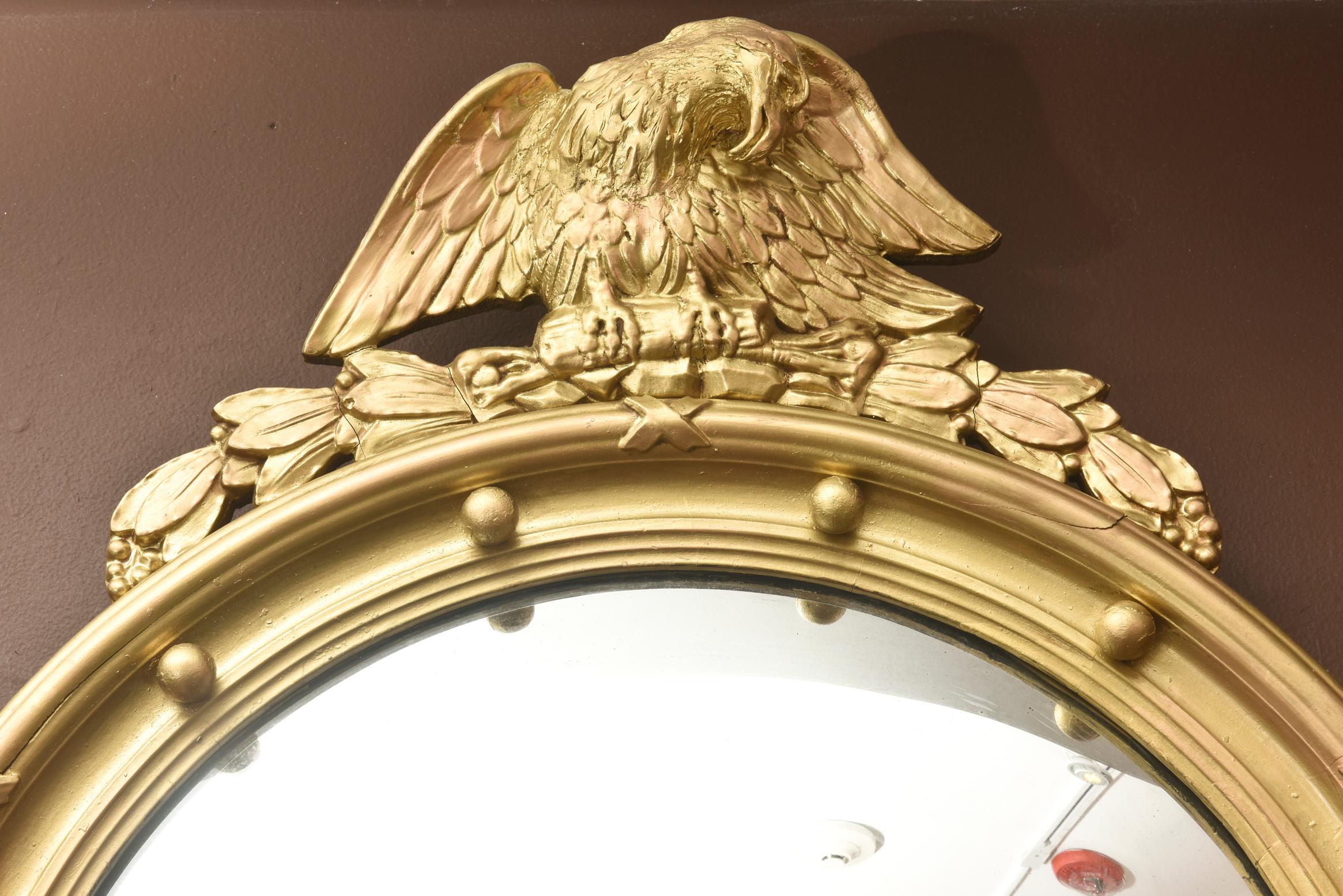 A classic Americana design with crisp detailing and in very nice vintage condition.
Large in dimension featuring a perched eagle flanked by acanthus surmounting. This realistic carved-like frame is constructed of a light weight composition and is