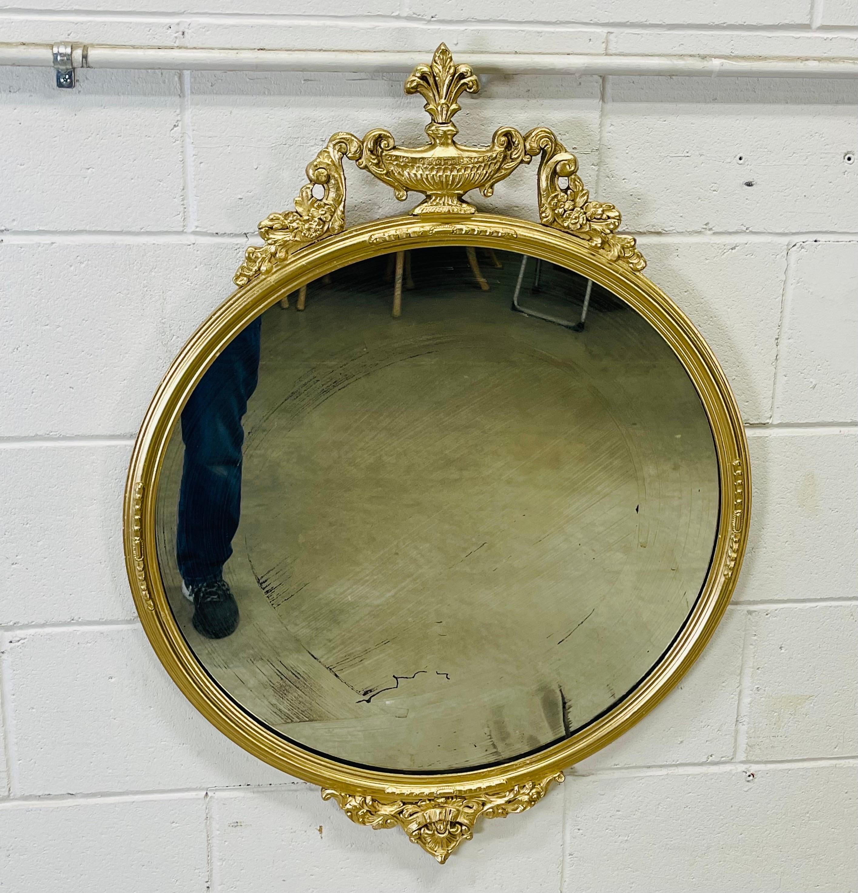 Vintage Federal style gilt painted round wood wall mirror. Some haze in the mirror from age. Hardware is included. No marks.