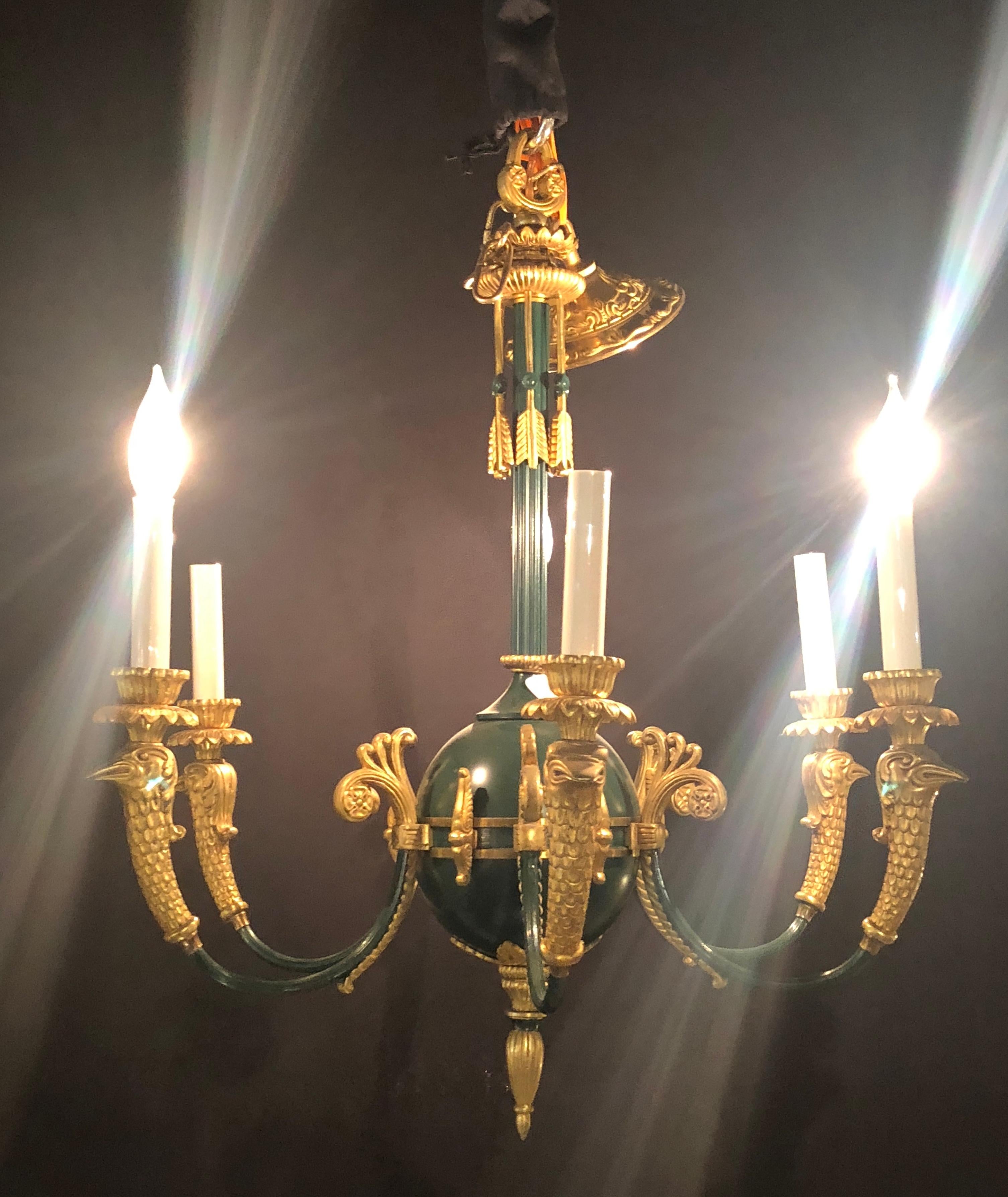 Federal Style Green Bronze Chandelier With Gilt Swan Heads. This lovely chandelier is certain to illumine any room in the home.