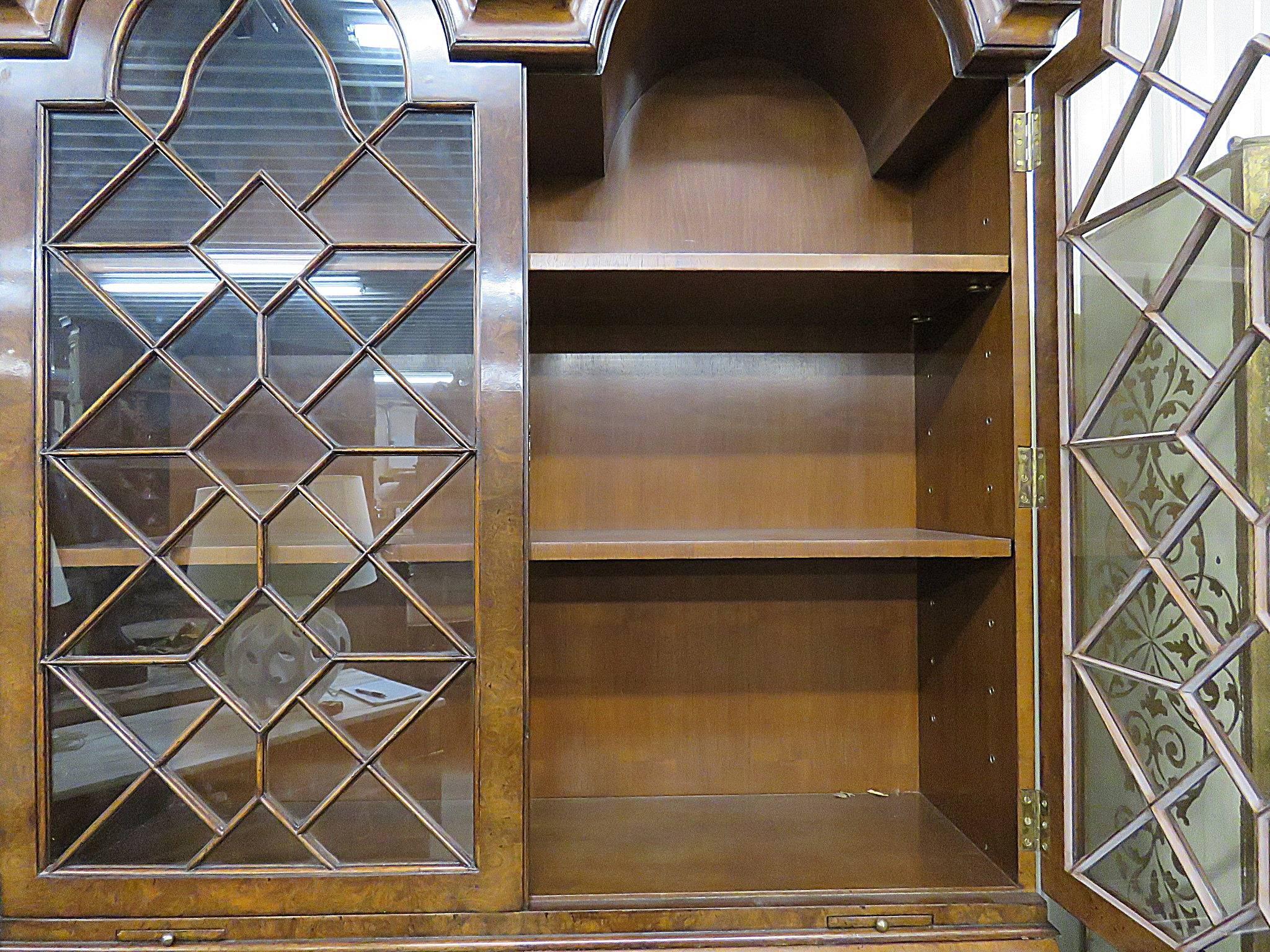 Federal style secretary desk with two doors over a drop desk and a hidden compartment over four drawers.