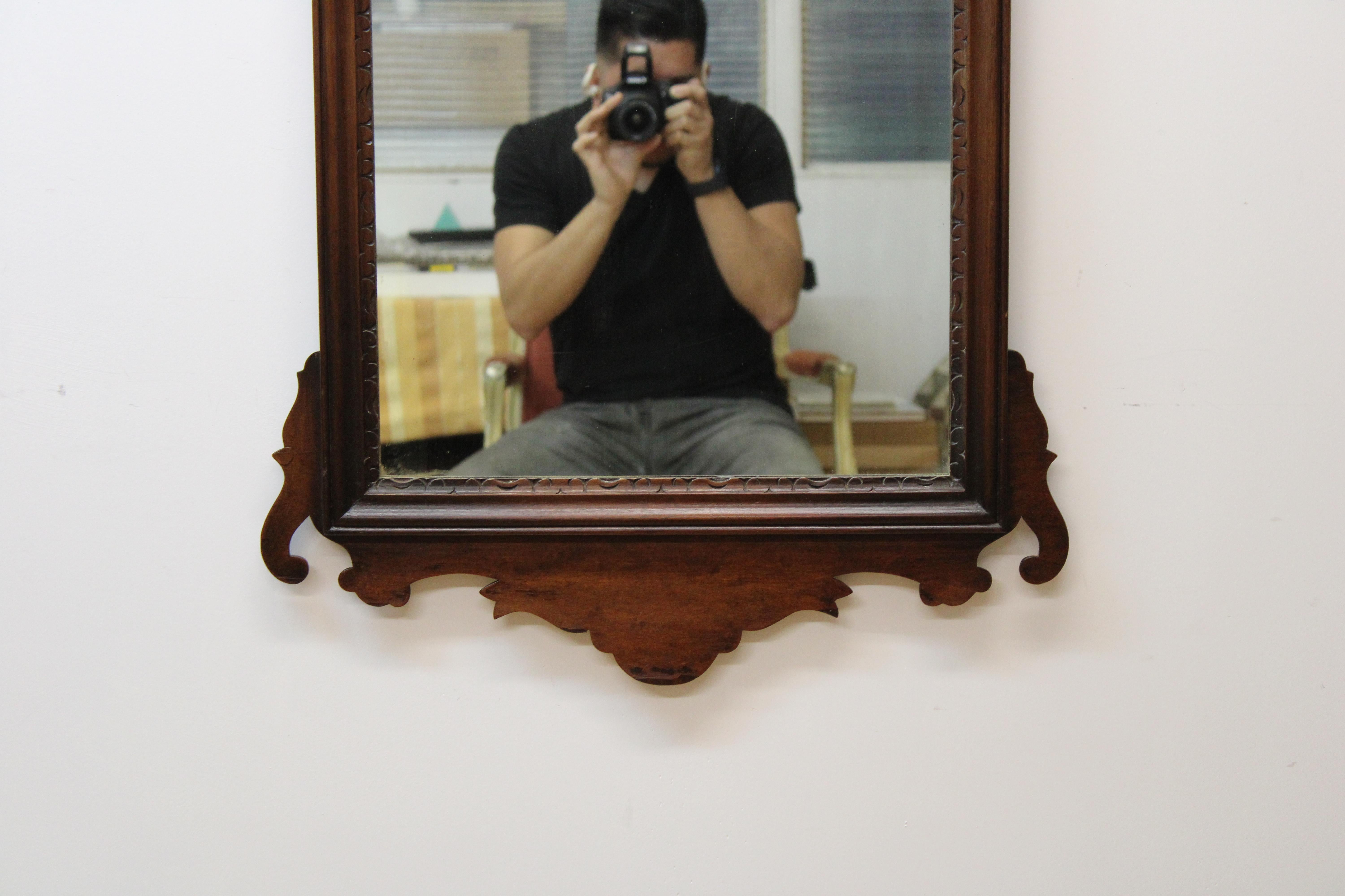 C. 19th century

Federal style walnut mirror.