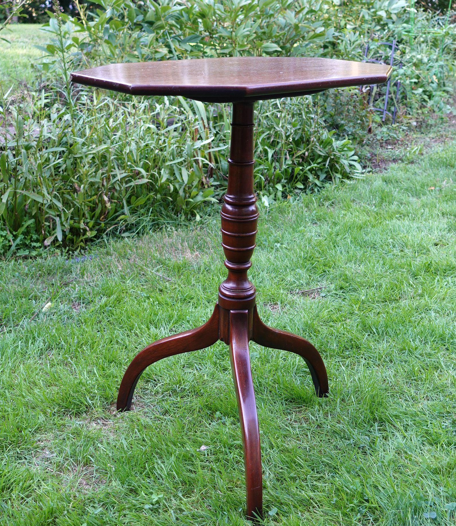 19th century
Elongated Mohagany octagonal tilt-top over finely turned column supported by three shapely legs.
Measures: 28