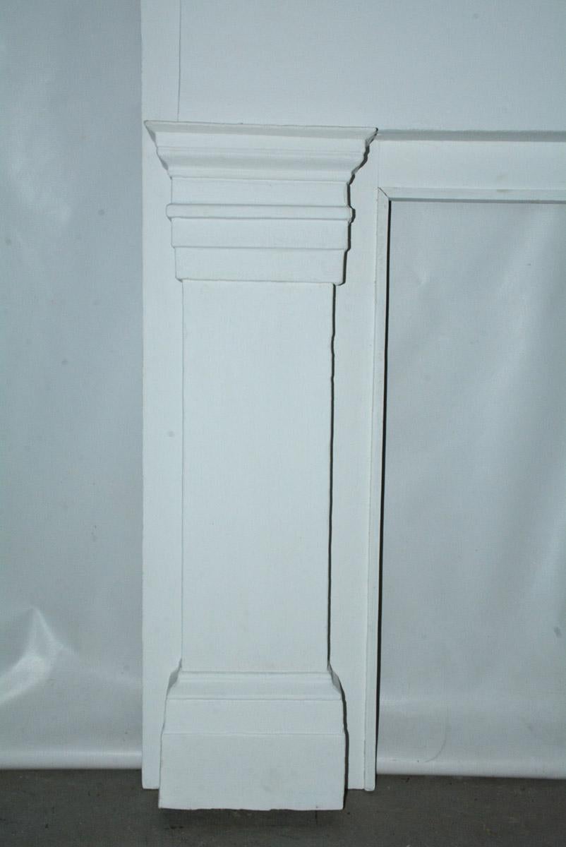 19th Century American white painted fireplace mantle with strong molding and handsome detailing.  
Dimensions of opening:  32.45