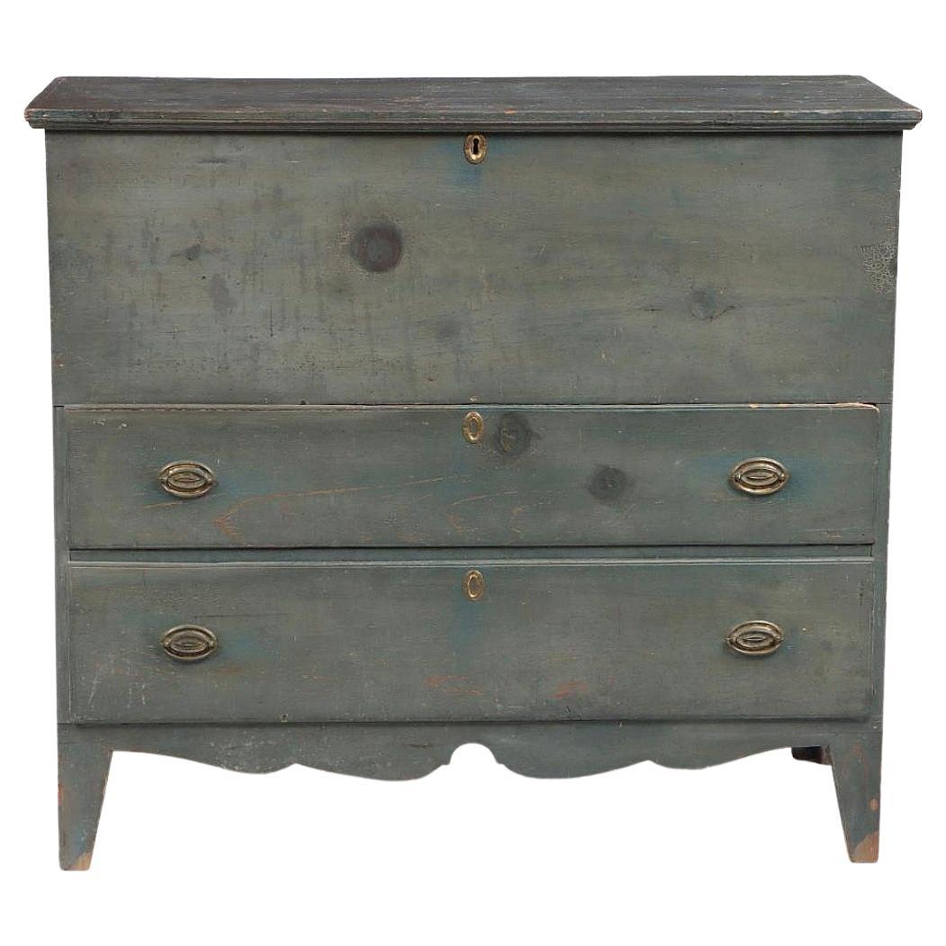 Beautiful federal two drawer blanket chest in the original blue paint ad retaining its gorgeous old dry surface.  Beautiful cut apron across the front as well as the sides. This chest also retaining the original brass pulls with Greek key pattern.