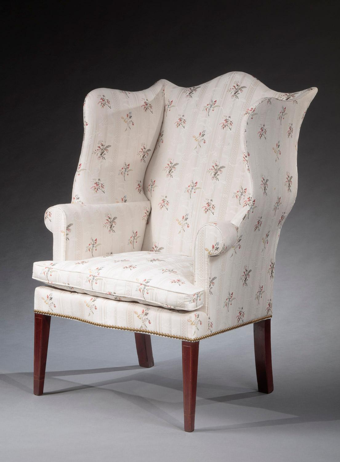 Federal Wing Chair
Massachusetts          Circa 1790

Primary Wood:  Mahogany
Secondary Woods:  Maple, Birch, White Pine

Height:  45 1/2 inches
Width:  27 1/2 inches
Depth: 22 1/2 inches
Seat Height: 18 inches with cushion

A very fine wing chair