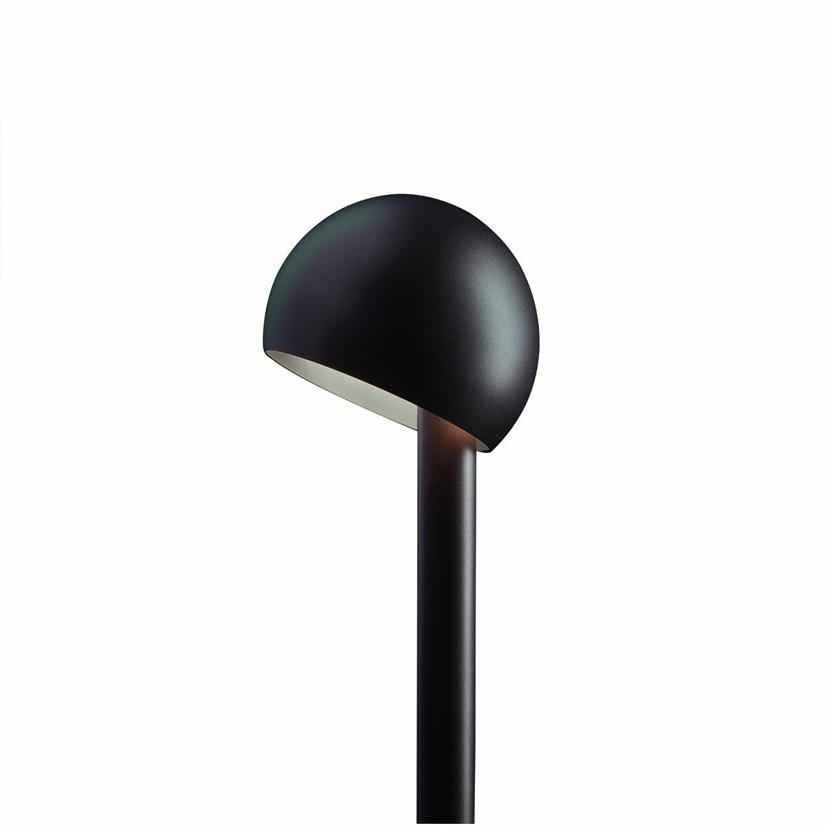 Outdoor lamp 'Otto' designed by Federica Farina in 2019. Outdoor lamp giving indirect led light with adjustable reflector and stem in painted Indian brown metal. Manufactured by Oluce, Italy.

Otto by Federica Farina, is a path-light with a soft,