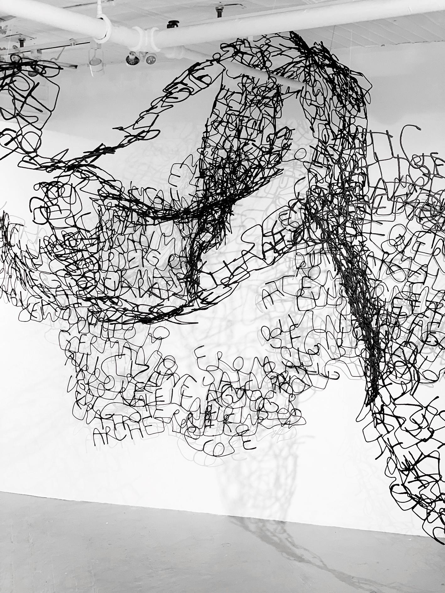 All Around Us est une installation immersive que les gens peuvent traverser, entourés d'environ 900 mots qui reflètent le lien ambigu entre la justice et le sacré, qui est profondément lié au maintien, à la perte et à la récupération de l'état