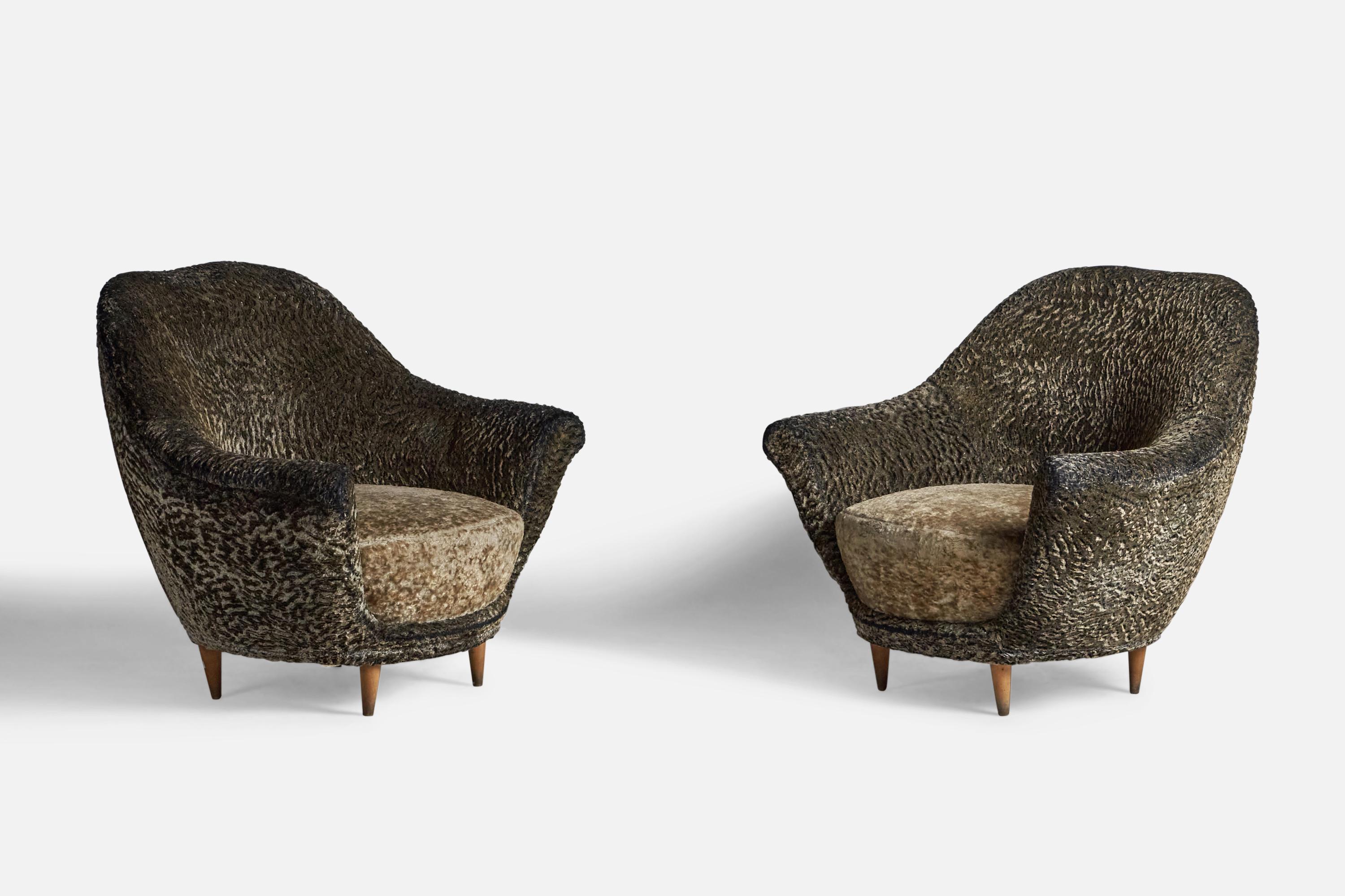 A pair of wood and fabric lounge chairs, designed and produced by Federico Munari, Italy, 1940s.

14.5