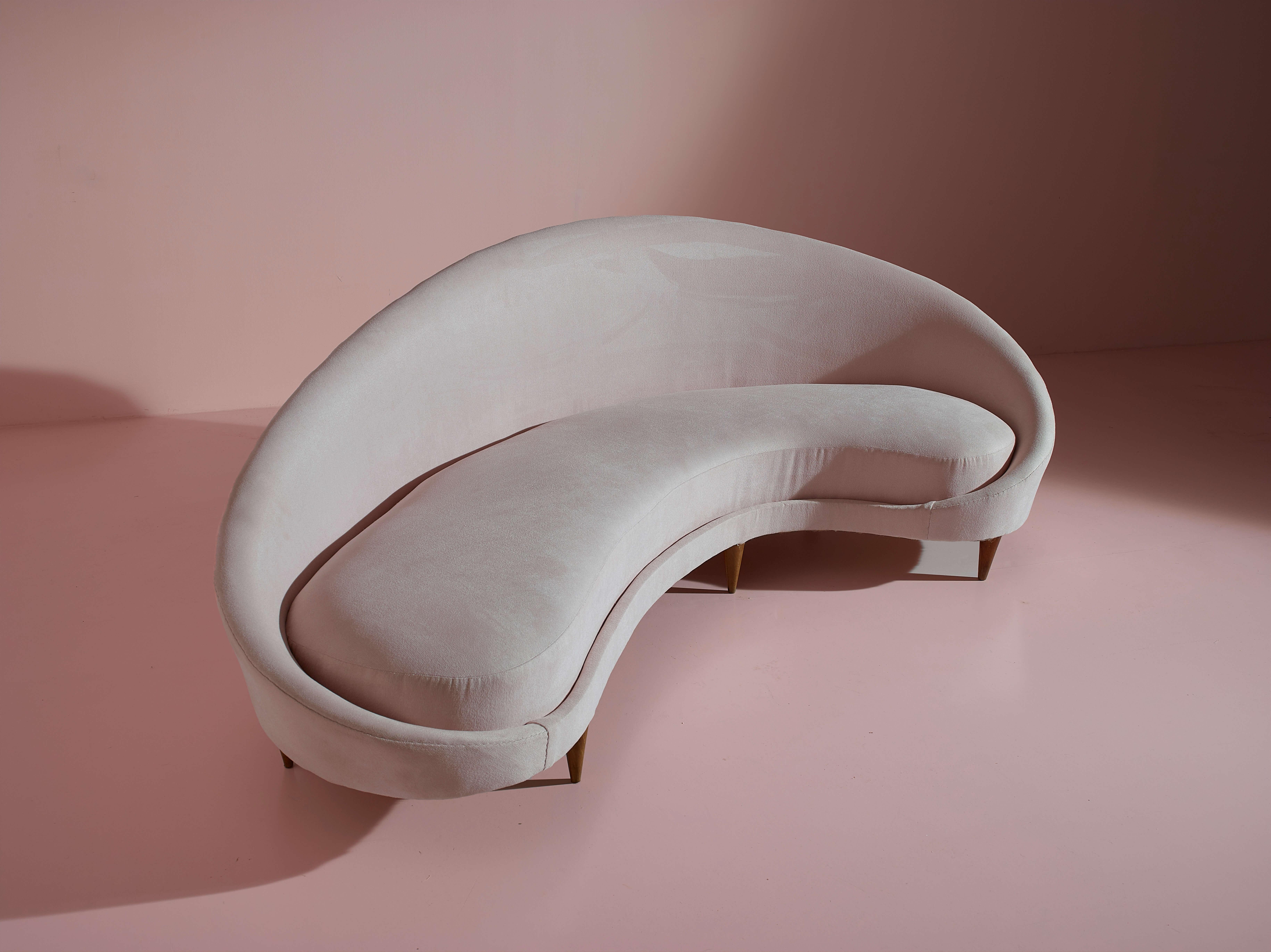 Mid-20th Century Federico Munari wood and fabric curved sofa, Italy, 1950s.