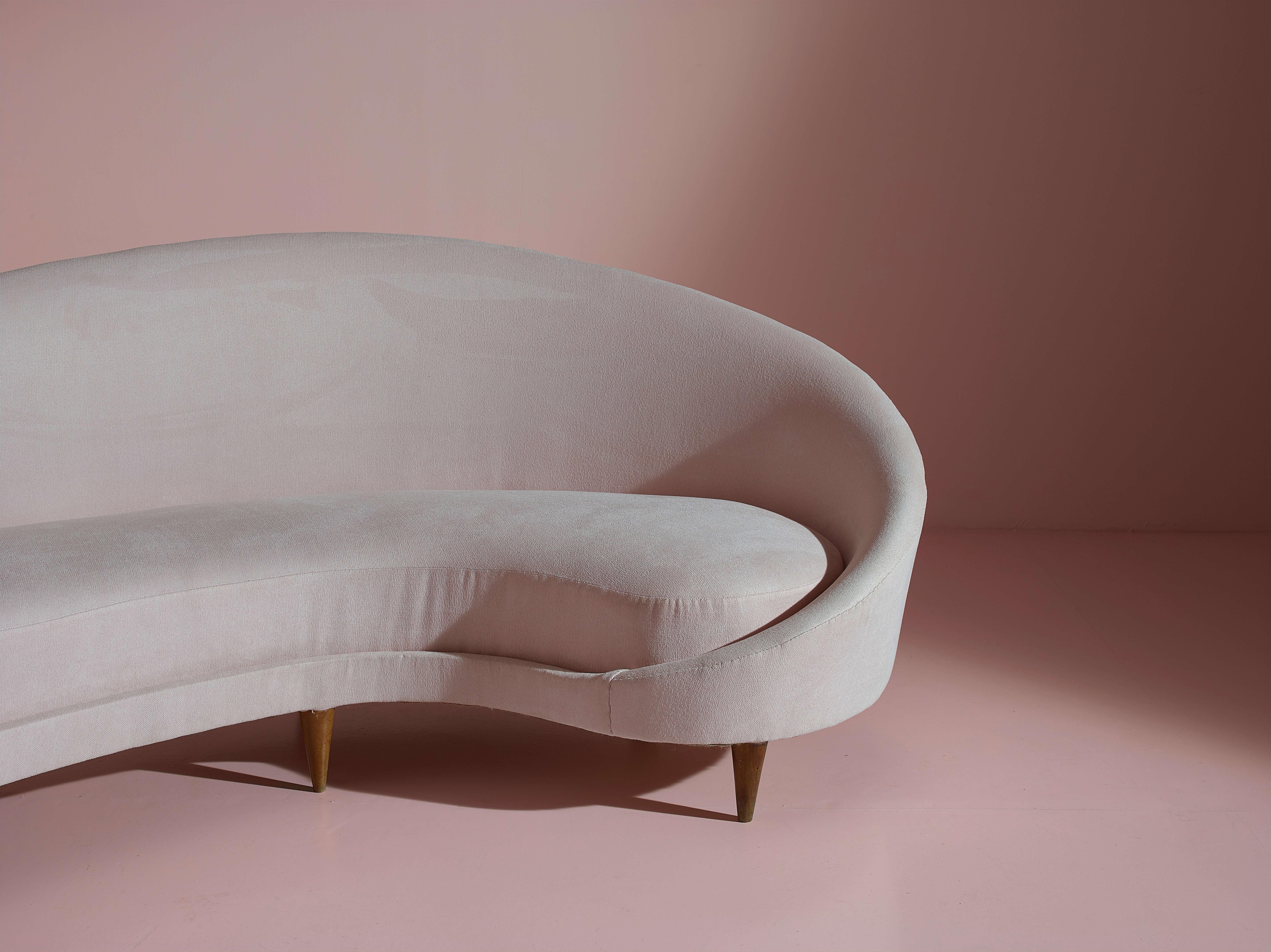 Fabric Federico Munari wood and fabric curved sofa, Italy, 1950s.