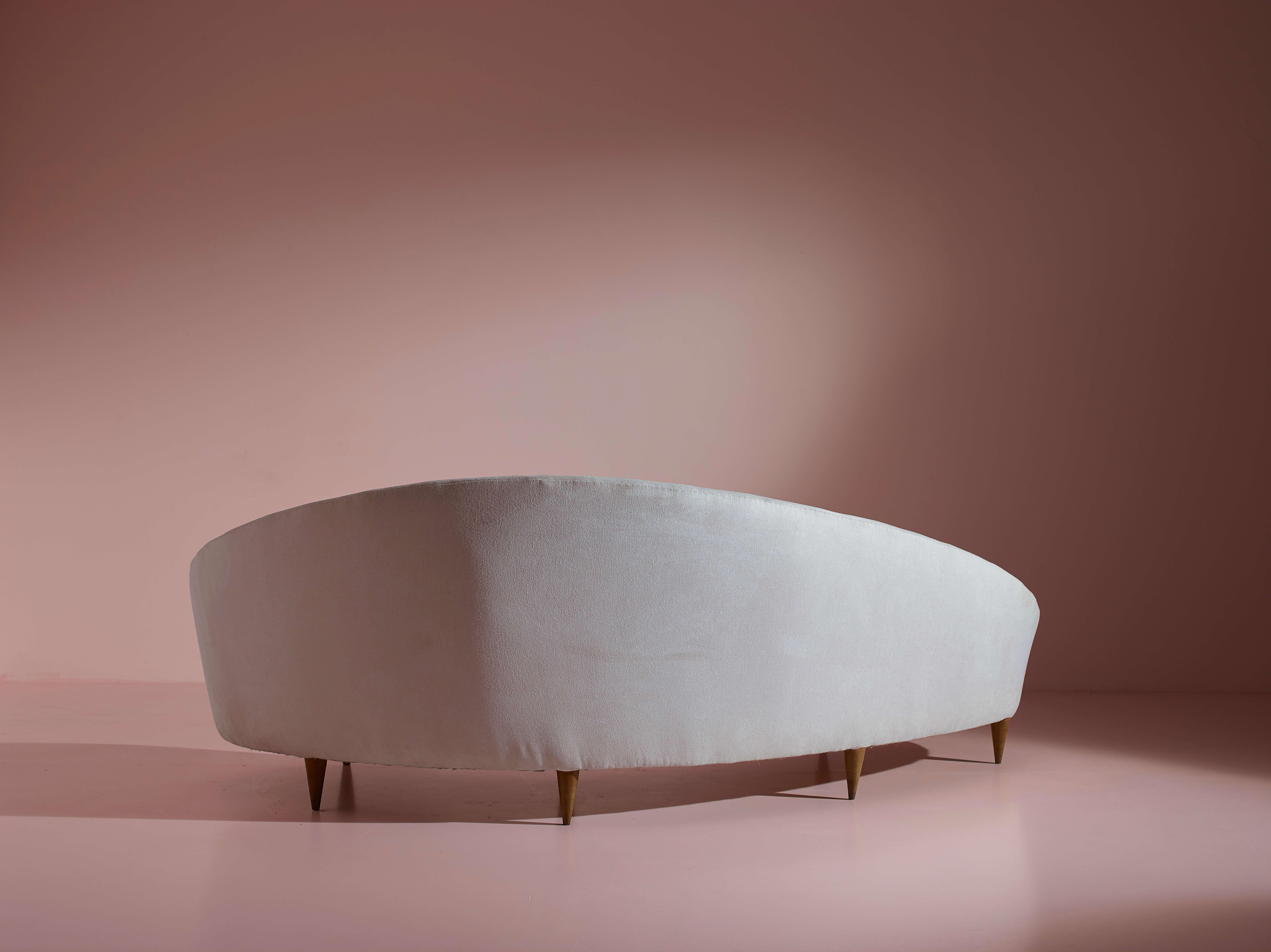 Federico Munari wood and fabric curved sofa, Italy, 1950s. 1