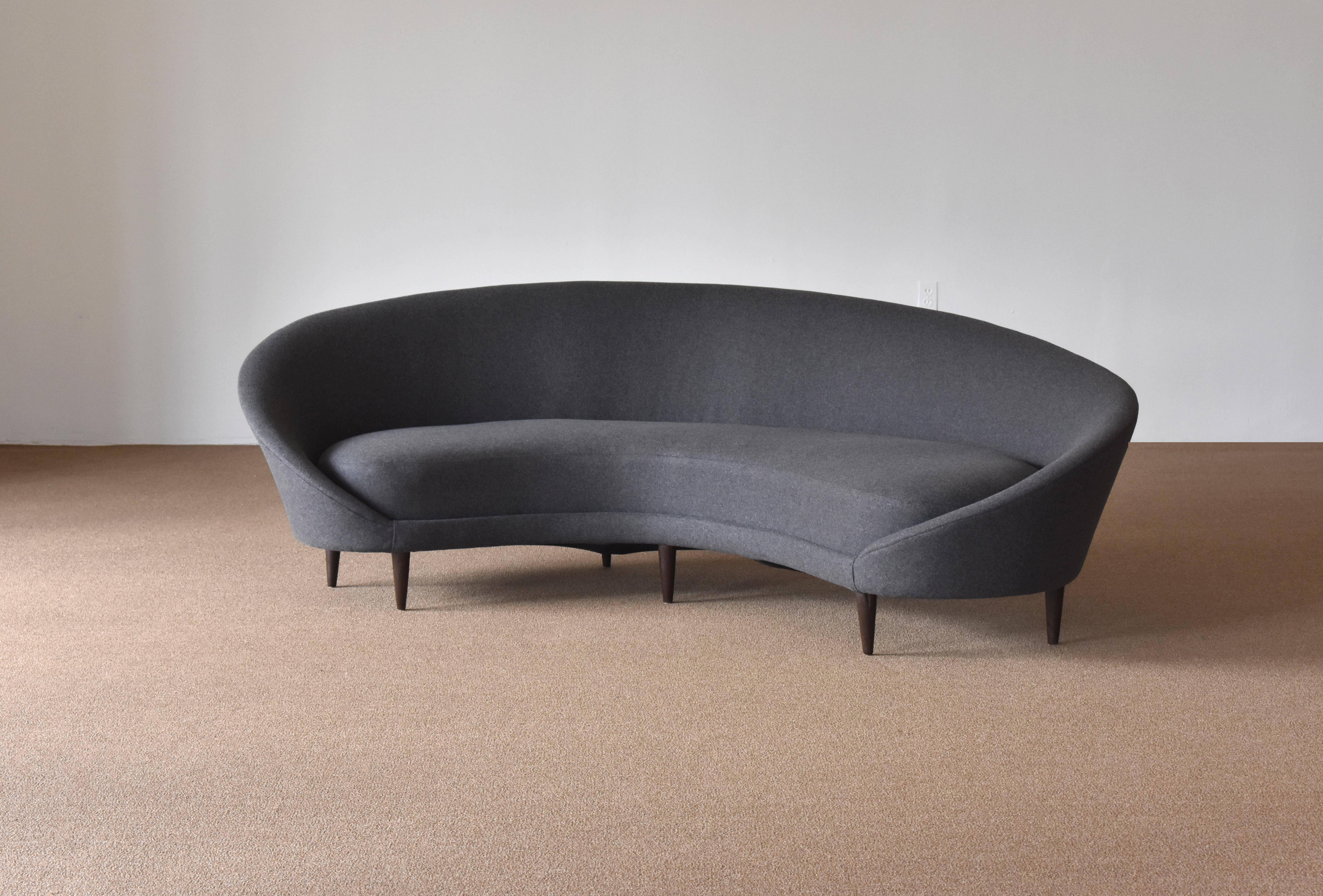 grey curved sofa