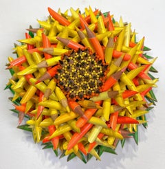 Fleur de crayon vert, jaune et orange