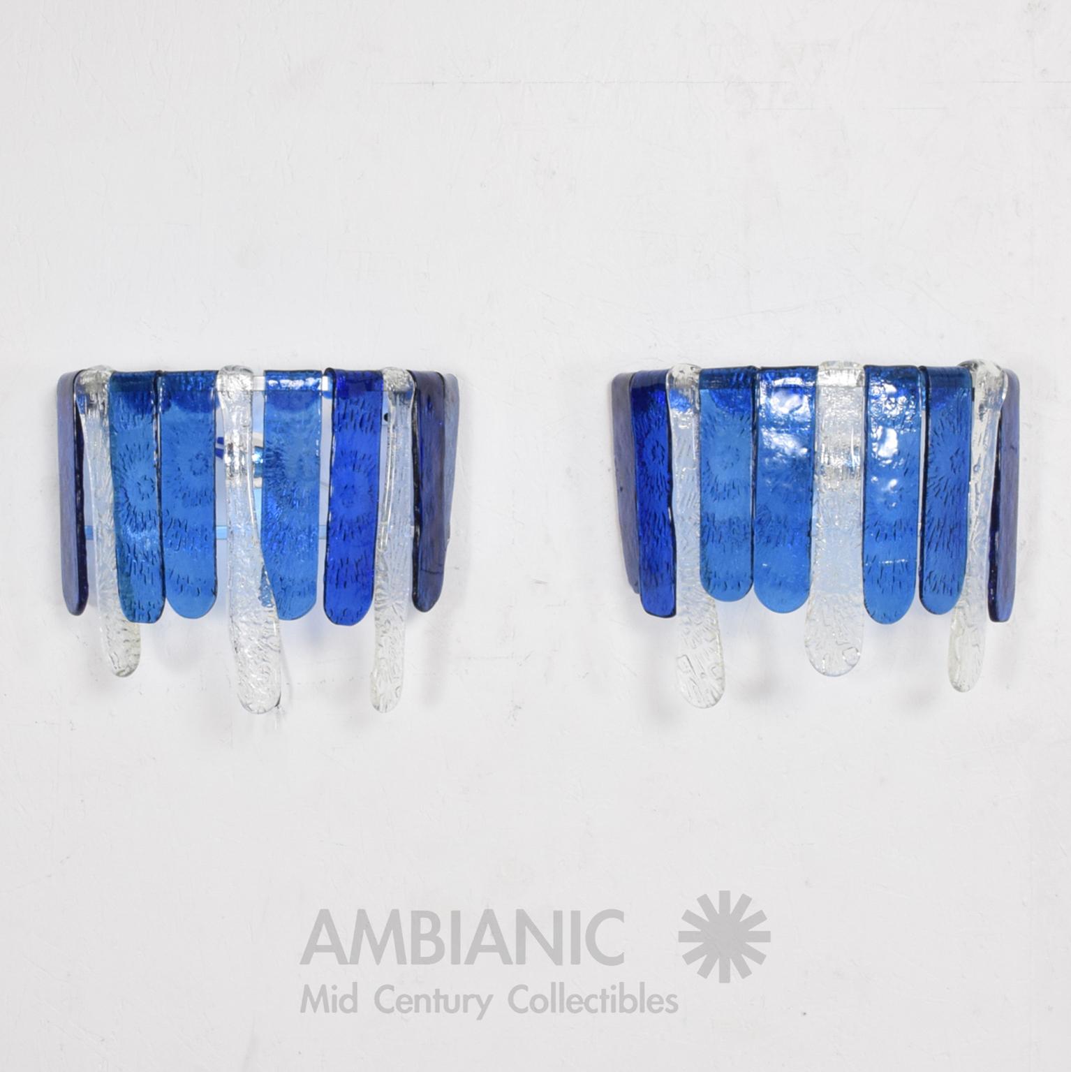 For your consideration: 1970s Mexico Mid-Century Modernism pair of hand blown glass wall sconces in a luscious blue and clear glass, attribution Feders- the renown Mexican modernist glass workshop featuring designs by Mexico City artisan Felipe