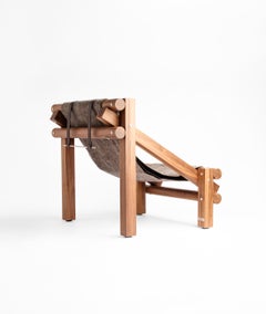 Poltrona in legno di noce e lana di Adrian Escarfullery