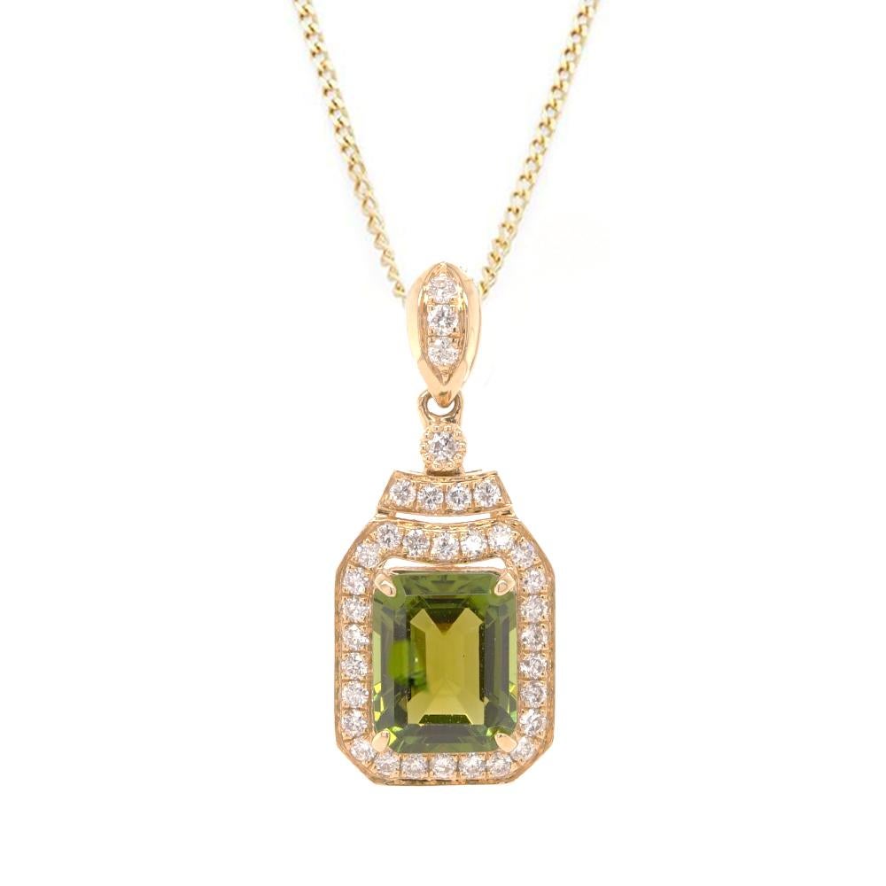 An exquisite 18ct yellow gold pendant, featuring a step-cut 1.06ct green tourmaline pendant, adorned with a dazzling diamond halo and bail. The total weight of diamonds is approximately 0.174ct. This dainty piece effortlessly suspends from an