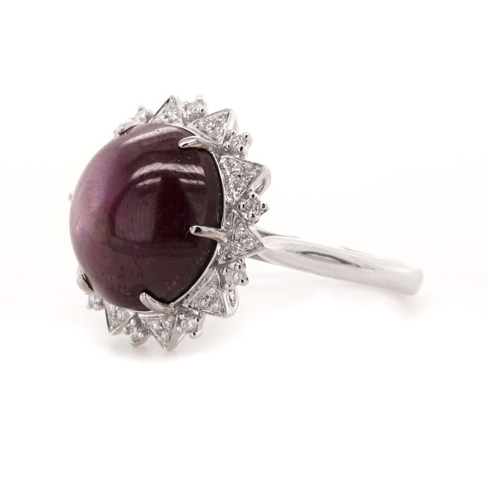 The star ruby in a majestic purple hue shines in this one-of-a-kind celestial ring. Star ruby is a rare variety of ruby that exhibits asterism; a six-rayed star that shimmers over the surface of the stone.   The star ruby in this Fei Liu ring weighs