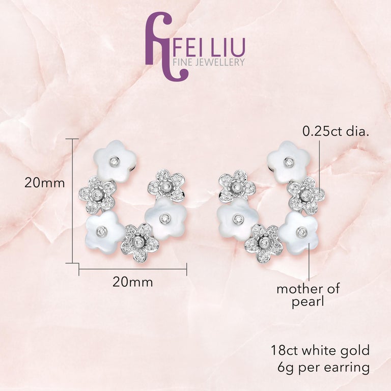 Description:
Alyssum 6 cluster stud hoop earrings with 0.25ct diamond-set flowers and flower shaped white mother of pearls. Set in 18ct white gold.

Inspiration:
The Alyssum Collection is a gold collection set with diamonds and iridescent mother of