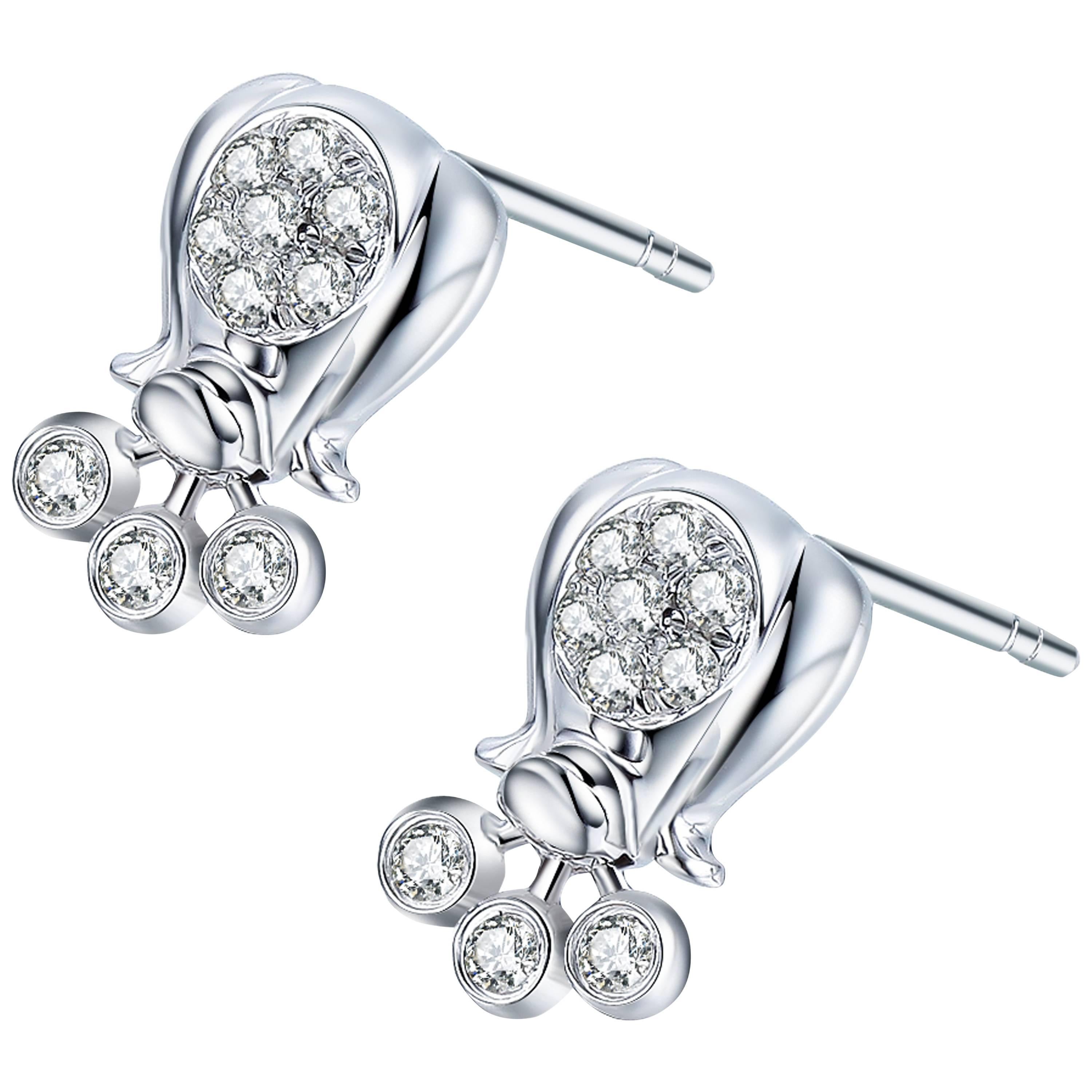 Description:
Lily of the Valley stud earrings with 0.182ct white diamonds, set in 9ct white gold with a high polish.

Inspiration:
The lily of the valley flower is one of the most beloved, opulent wedding flowers, which symbolises purity and