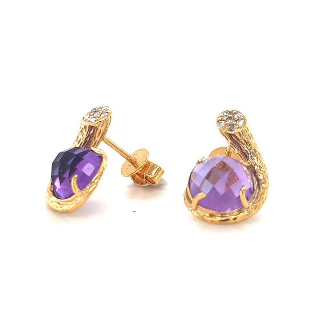 The Fei Liu 'Dawn' collection is a Kayman Award-winning collection. These Dawn stud earrings capture the beautiful texture and colour of the deep ocean wonders. Featuring briolette-cut purple amethyst with dazzling diamonds in 18ct yellow gold.

-
