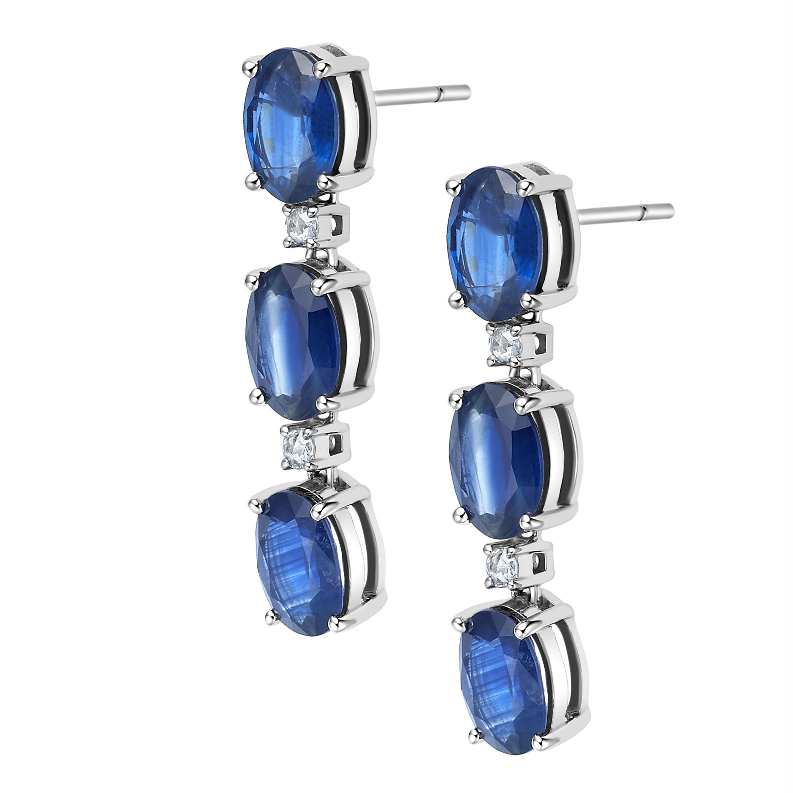 Description:
Drop earrings with 5.23ct blue sapphires and 0.068ct white diamonds, set in 18ct white gold.

Inspiration:
Often times the beauty of a gemstone speaks for itself. This is the case of the deep royal blue sapphire. Sapphires come in a