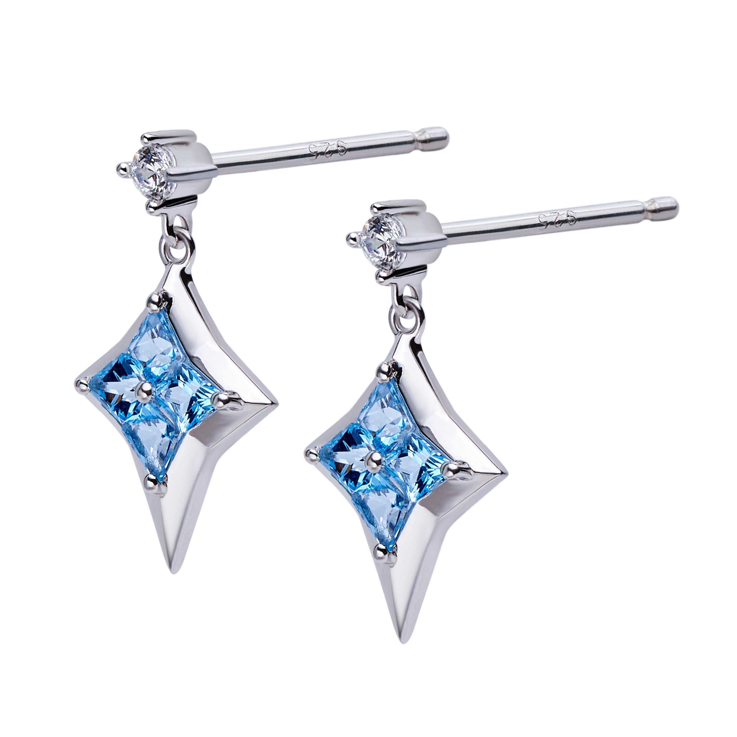 Description:
Star of Love North Star drop earrings with 0.6ct blue topazes and white cubic zirconia, set in white rhodium plate on sterling silver.

Inspiration:
The Star of Love series is inspired by the Polaris – the brightest star of the