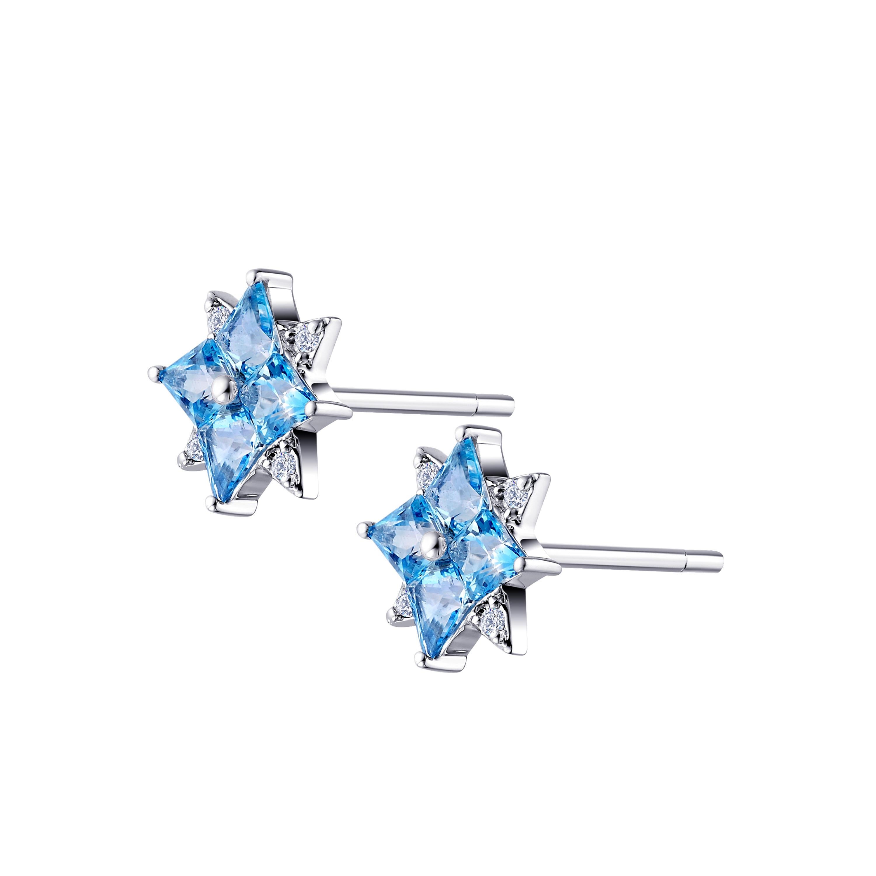 Description:
Star of Love Mini Star stud earrings with 0.6ct blue topazes and white cubic zirconia, set in white rhodium plate on sterling silver.

Inspiration:
The Star of Love series is inspired by the Polaris – the brightest star of the