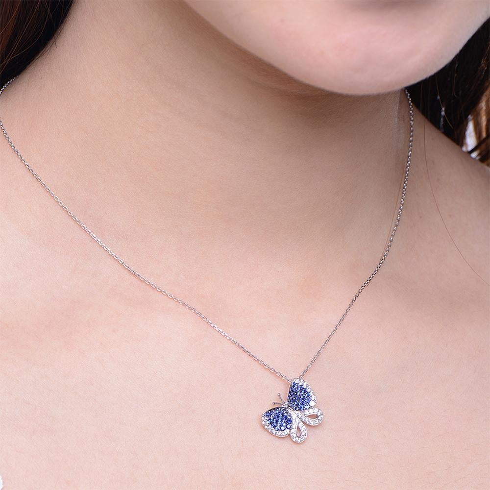 Butterfly captures the feminine essence and the carefree, joyful movement of these intricate and delicate creatures in sparkling weightless jewels. Butterfly pendant with wings bejewelled in royal blue and white cubic zirconia set in white rhodium