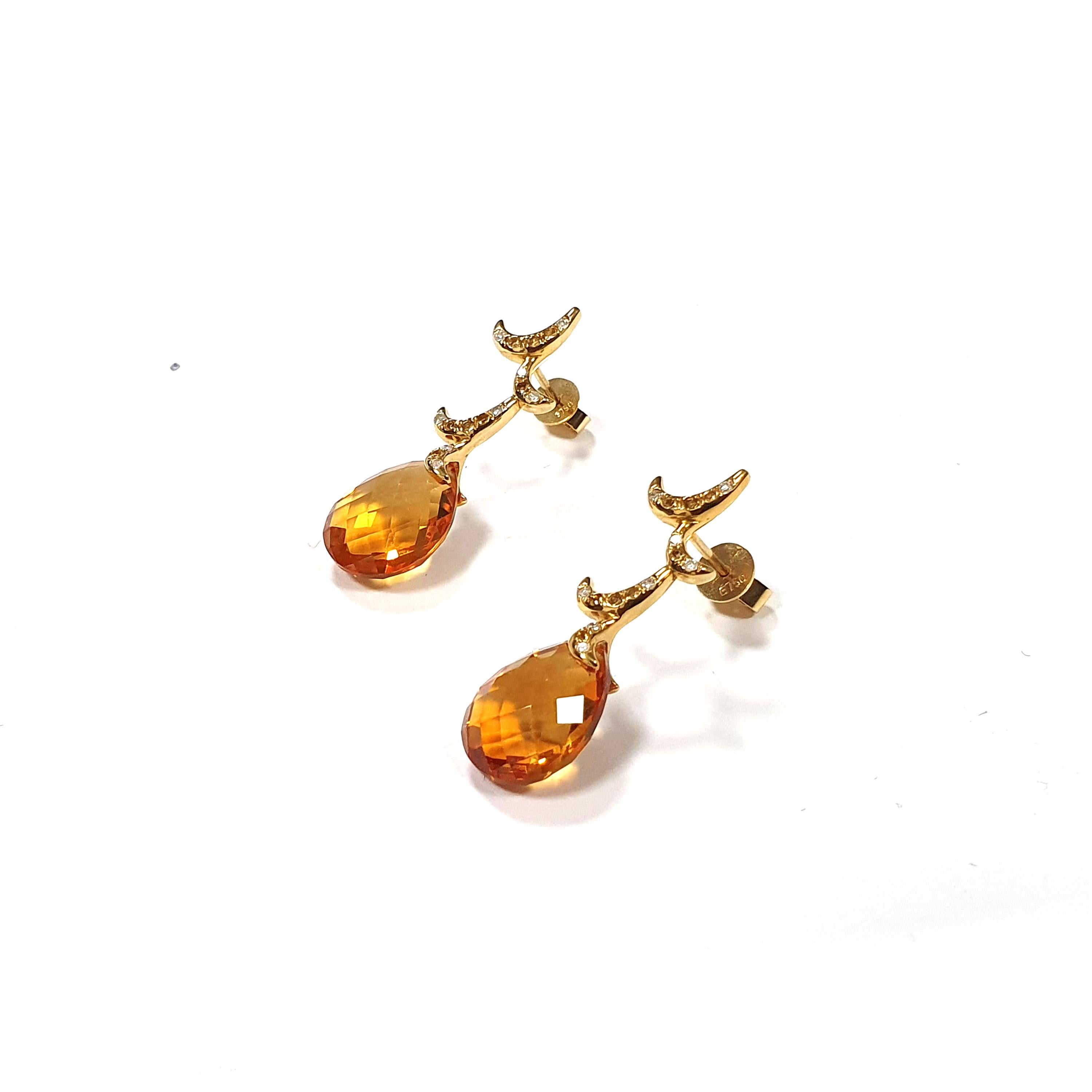 Description:
Whispering medium briolette earrings featuring 13mm x 10mm citrine briolettes and 0.10ct diamonds and 0.05ct citrines. Set in high polish 18ct yellow gold.

Inspiration:
Emulating femininity and glamour, the Whispering collection is