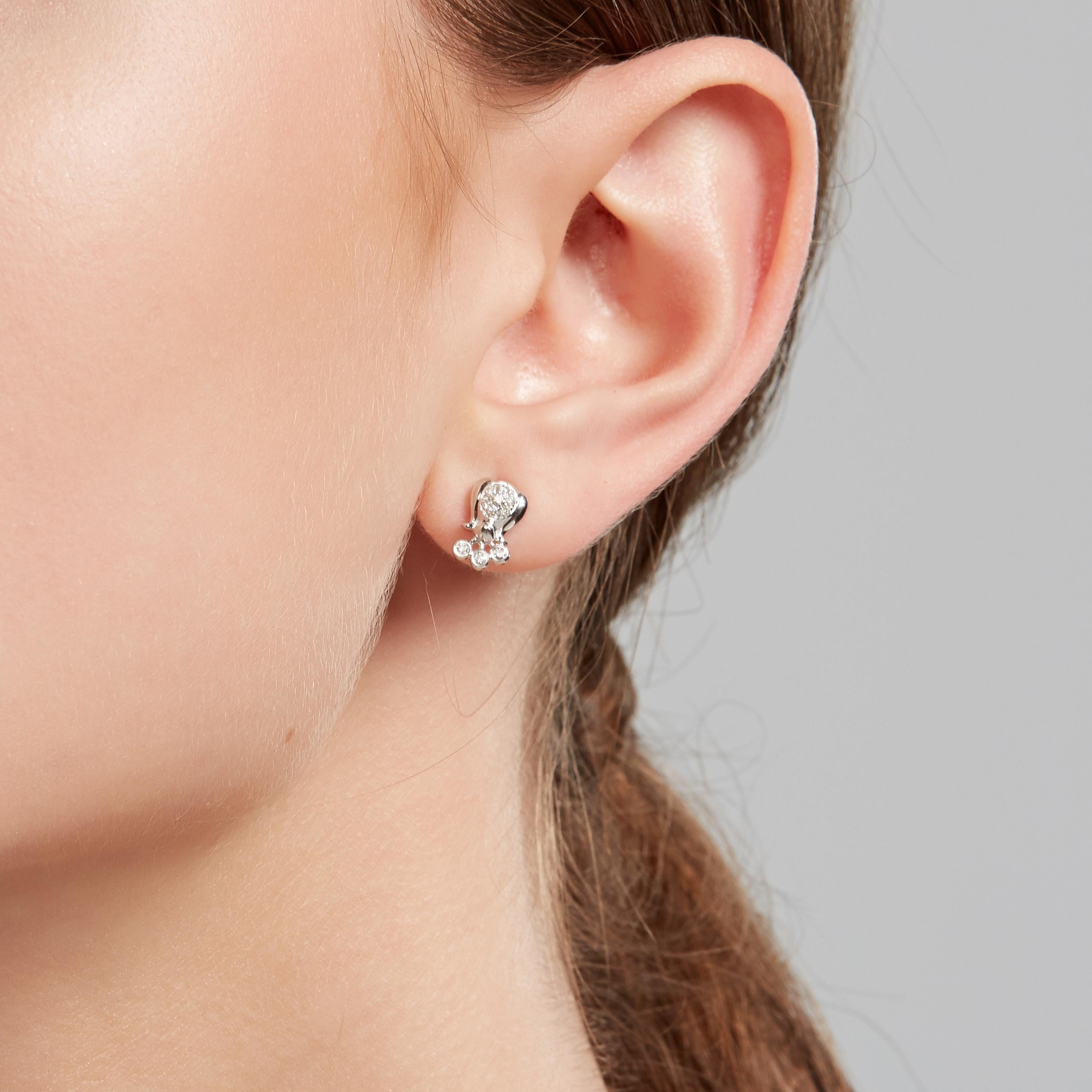 Perfect for ornating your ear alongside your favourites. A Lily of the Valley single stud earring with white diamonds, set in 9ct white gold with a high polish.

- Size (LxW): 9mm x 6mm
- Weight: 0.7gm
- Earring fitting: post

Fei Liu Fine Jewellery