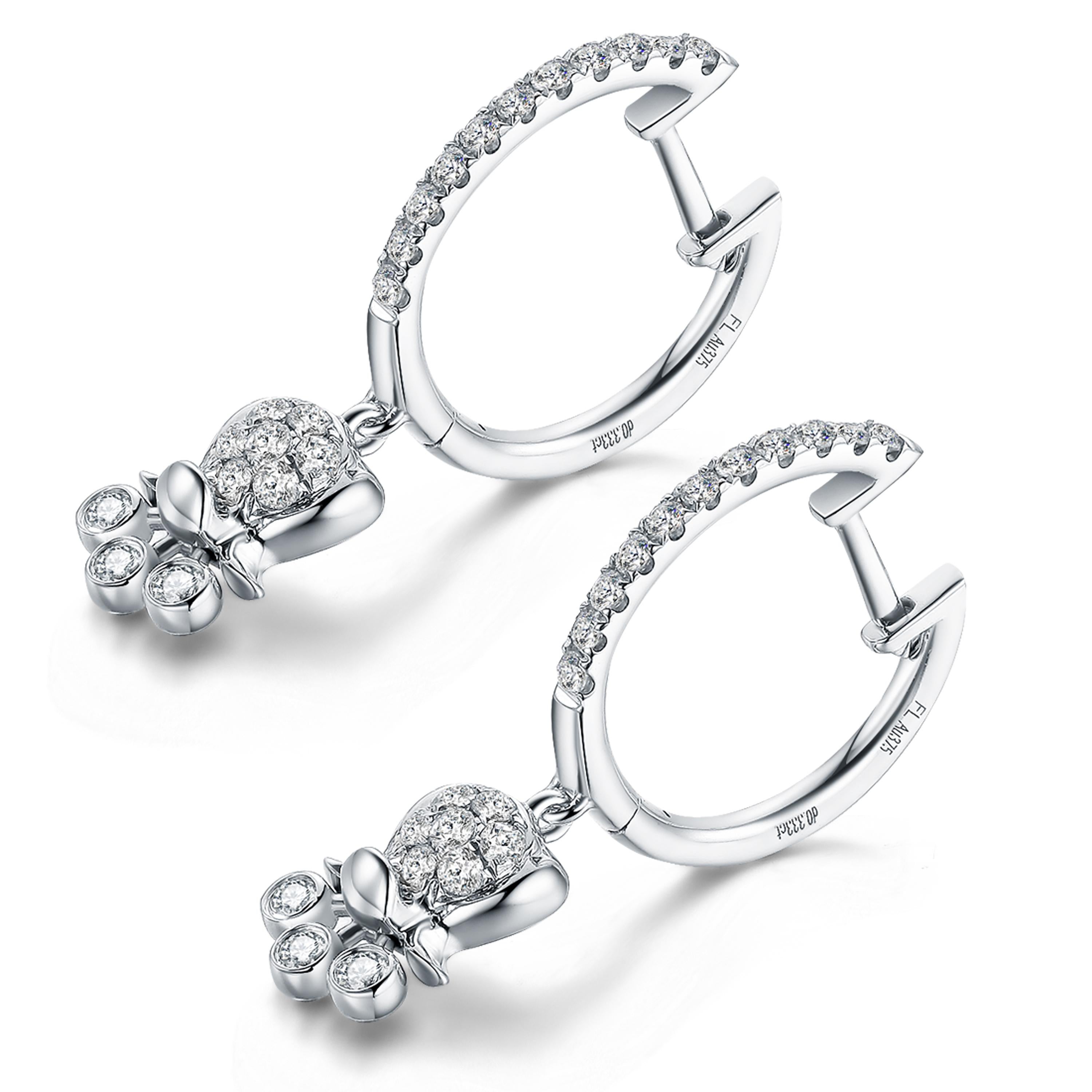 Description:
Lily of the Valley drop earrings with 0.333ct white diamonds, set in 9ct white gold with a high polish.

Inspiration:
The lily of the valley flower is one of the most beloved, opulent wedding flowers, which symbolises purity and