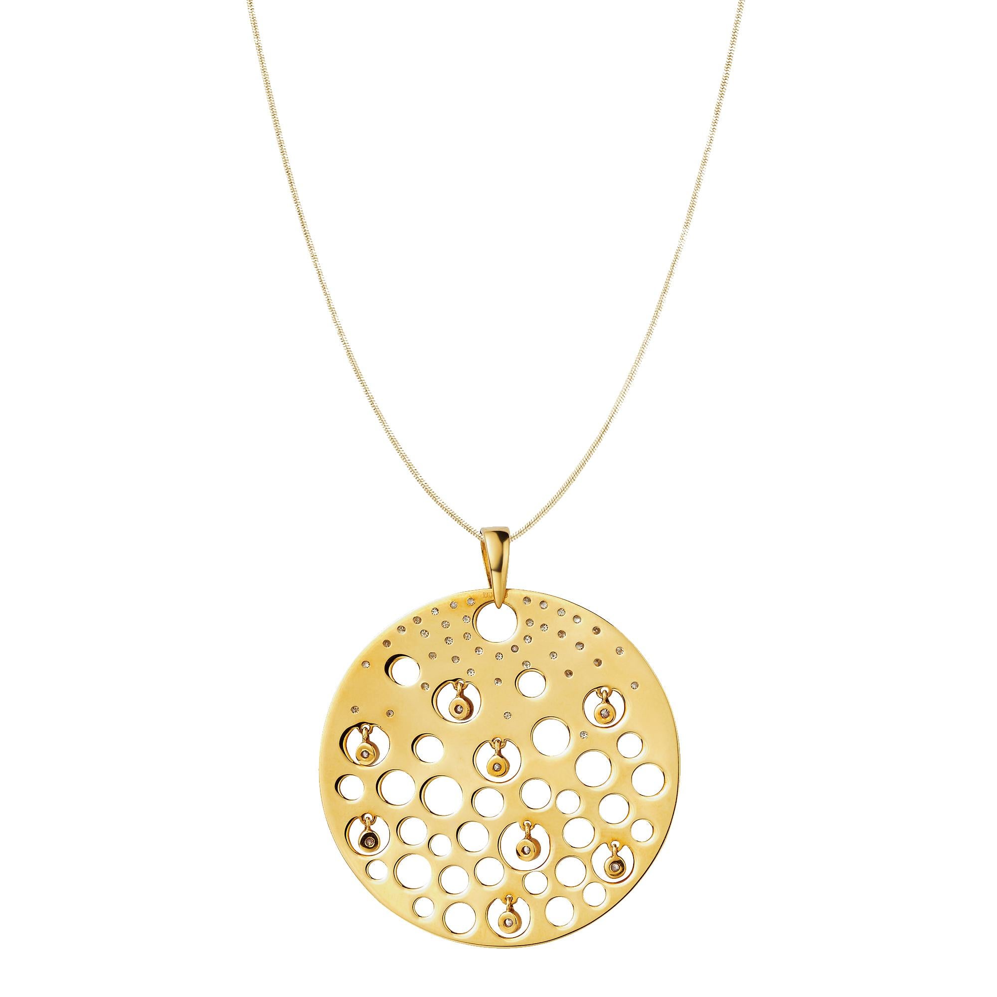 Description:
Drop pendant with 0.24ct-0.4ct white diamonds set in satin-finished 18ct yellow gold. 

Inspiration:
The subtle shimmer of the Drops collection is brought to life when worn, with delicately suspended gemstones forming an illusion of the