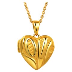 Fei Liu Gold Plated Silver 'Love' Inscribed Heart Locket with Inner Syn. Ruby